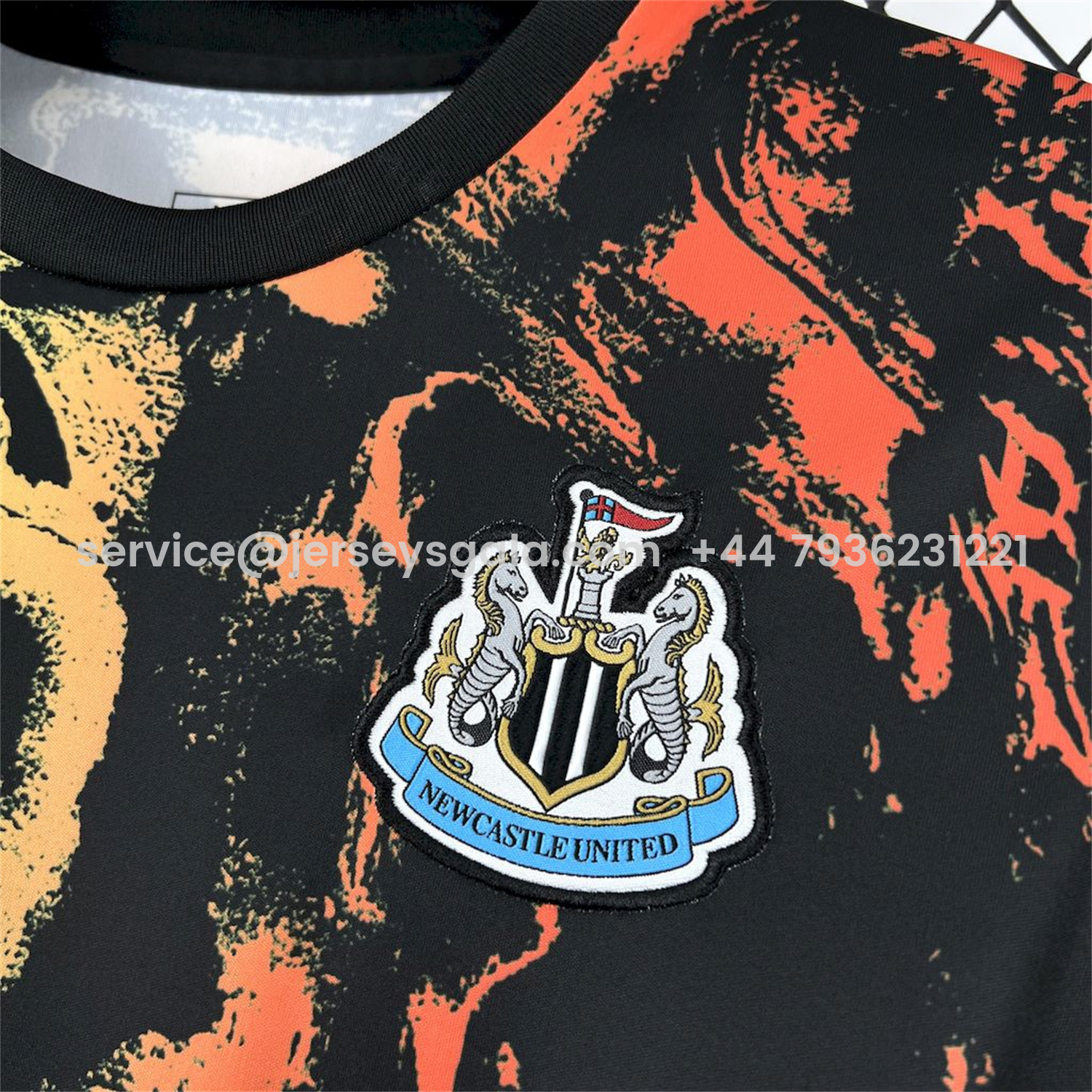 JerseysGala.com | Newcastle United 25-26 Orange Red Graffiti Black Pre-Match Training Jersey - Fans Version -Customize Name, Number and Patch | Worldwide Shipping