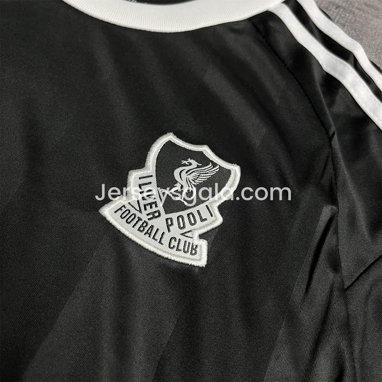 JerseysGala.com | Liver.pool 25-26 Trefoil Black Goalkeeper Kids Kit -Customize Name, Number and Patch | Worldwide Shipping