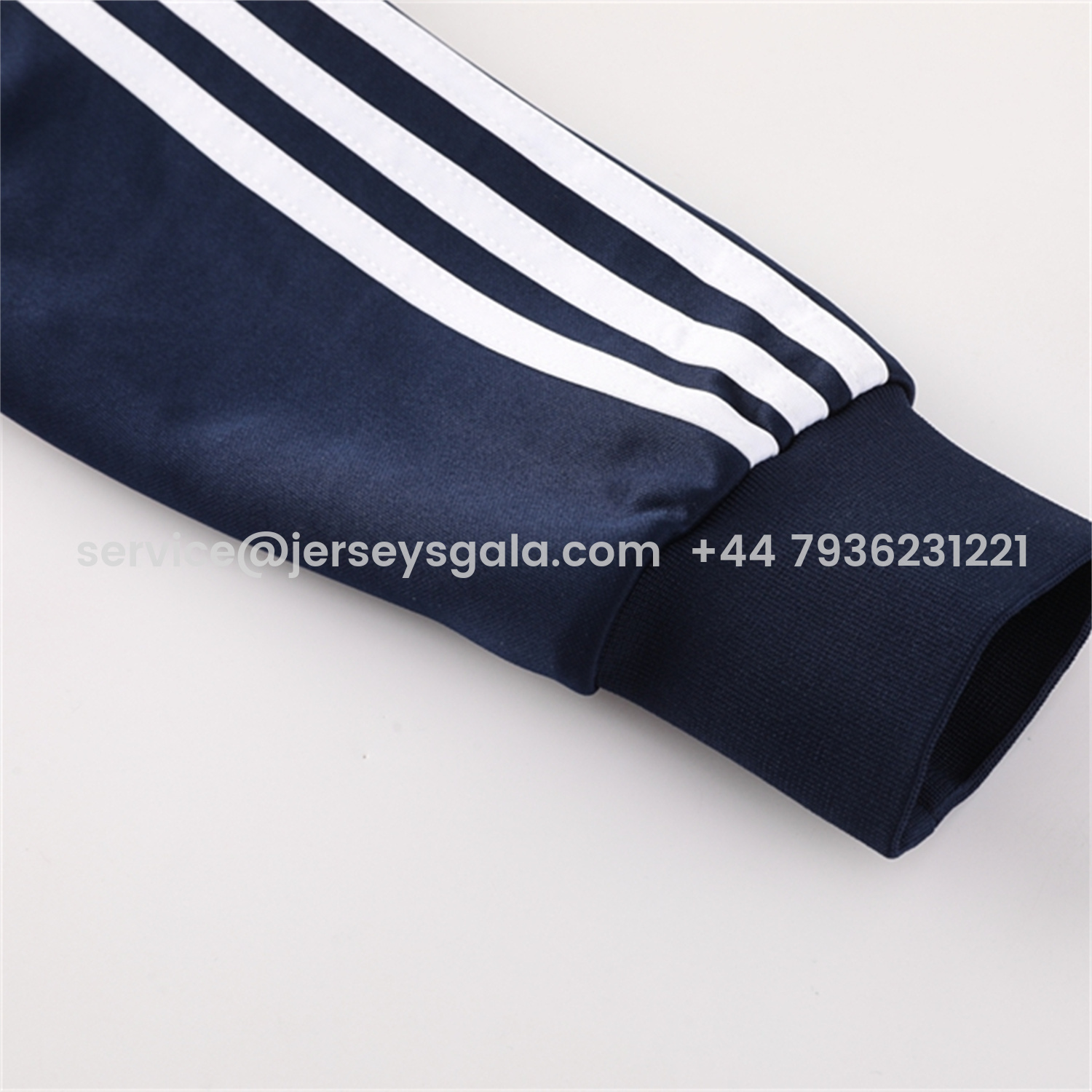JerseysGala.com | Real Madrid 25-26 Jacket Training Tracksuit - Royal Blue Jackets & Pants with Orange Lines -Customize Name, Number and Patch | Worldwide Shipping