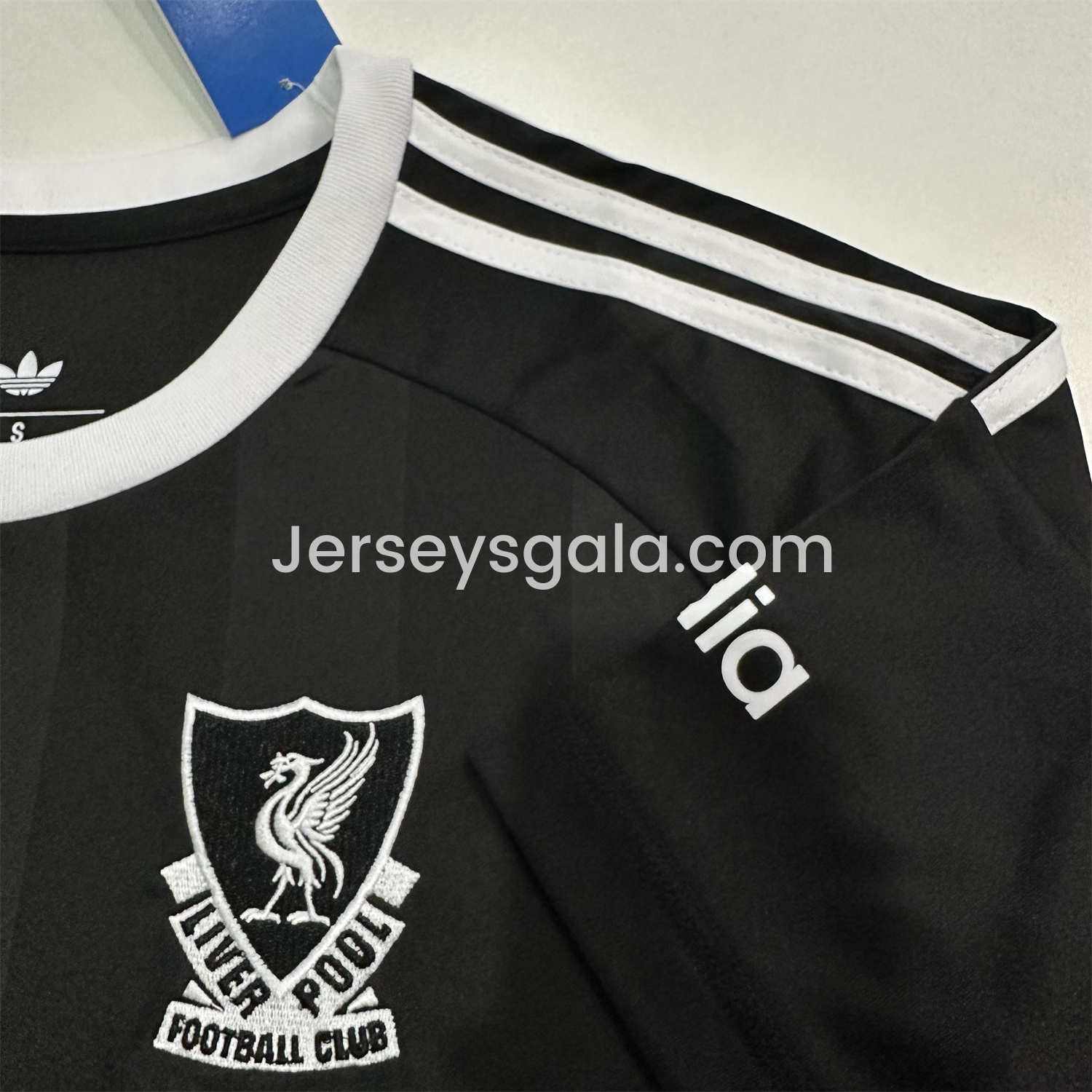 JerseysGala.com | Liver.pool 25-26 Black Trefoil Goalkeeper Jersey - Fans Version -Customize Name, Number and Patch | Worldwide Shipping