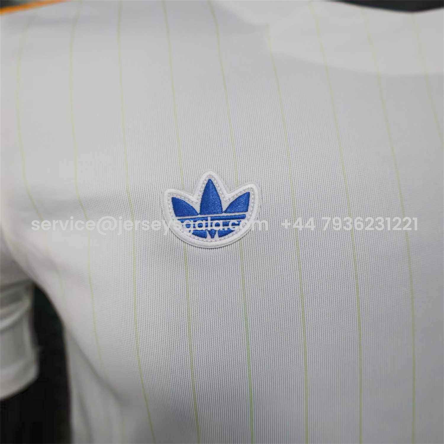 JerseysGala.com | Real Madrid 25-26 Trefoil Blue Lines White Travel Jersey - Player Version -Customize Name, Number and Patch | Worldwide Shipping