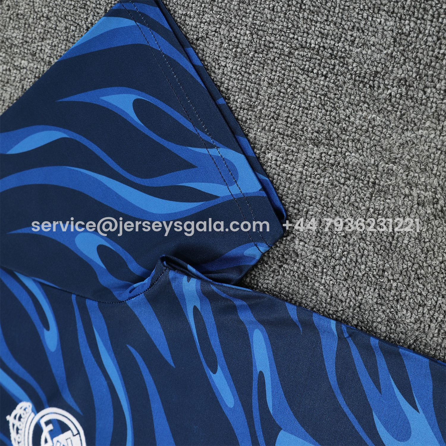 JerseysGala.com | Real Madrid 25-26 Short-Sleeve Training Set - Blue Water Pattern Top & Deep Blue Shorts -Customize Name, Number and Patch | Worldwide Shipping