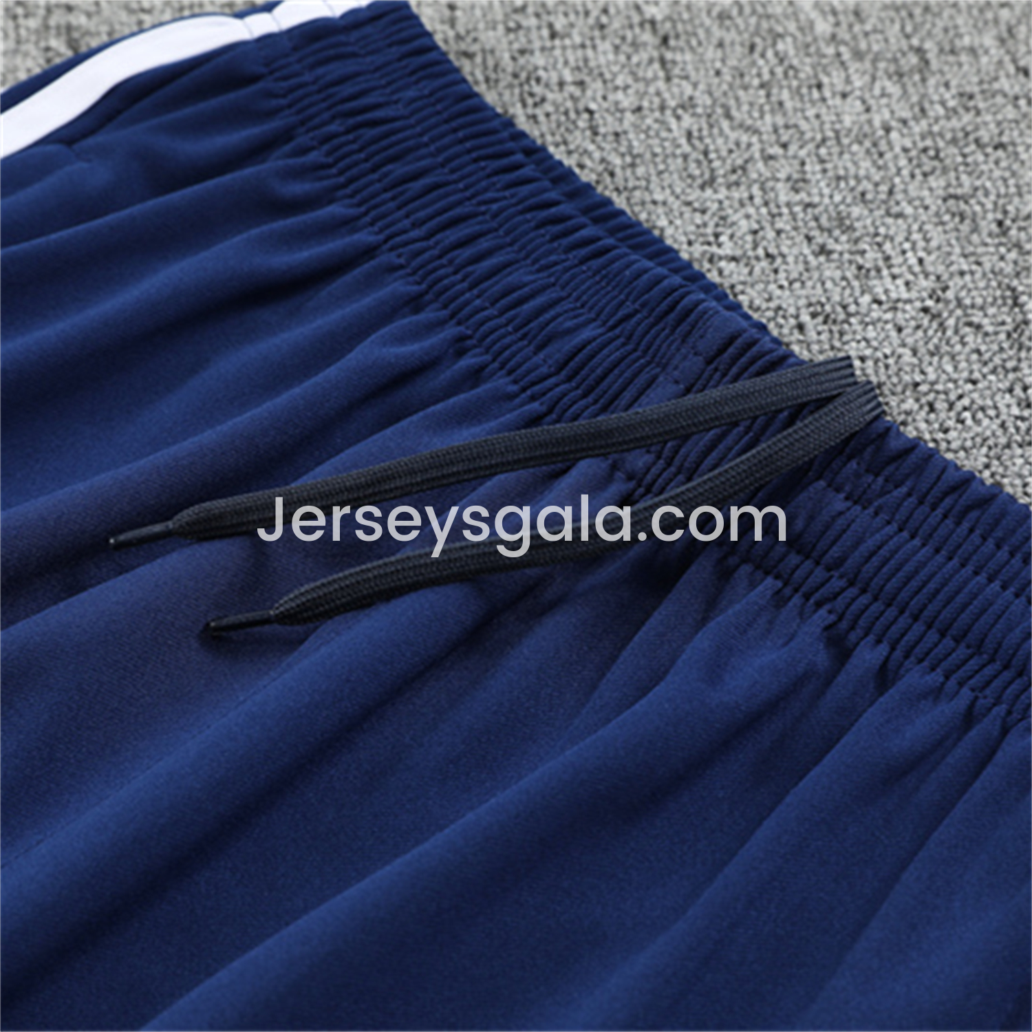 JerseysGala.com | Real Madrid 25-26 Kids Long Sleeves Training Set - Green Line White Top and Blue Pants -Customize Name, Number and Patch | Worldwide Shipping