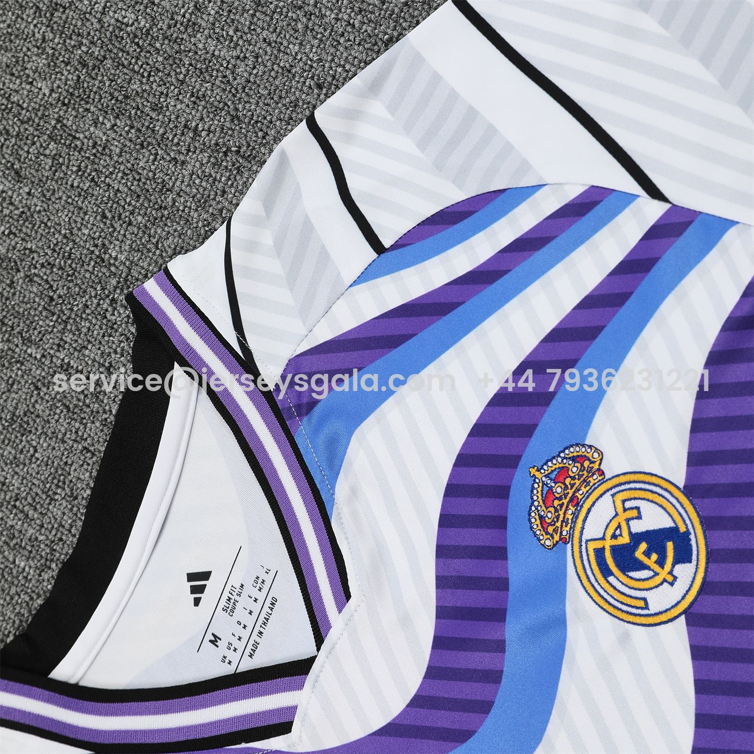 JerseysGala.com | Real Madrid 25-26 Short-Sleeve Training Set - Blue Purple Curve Pattern Top & Black Shorts -Customize Name, Number and Patch | Worldwide Shipping
