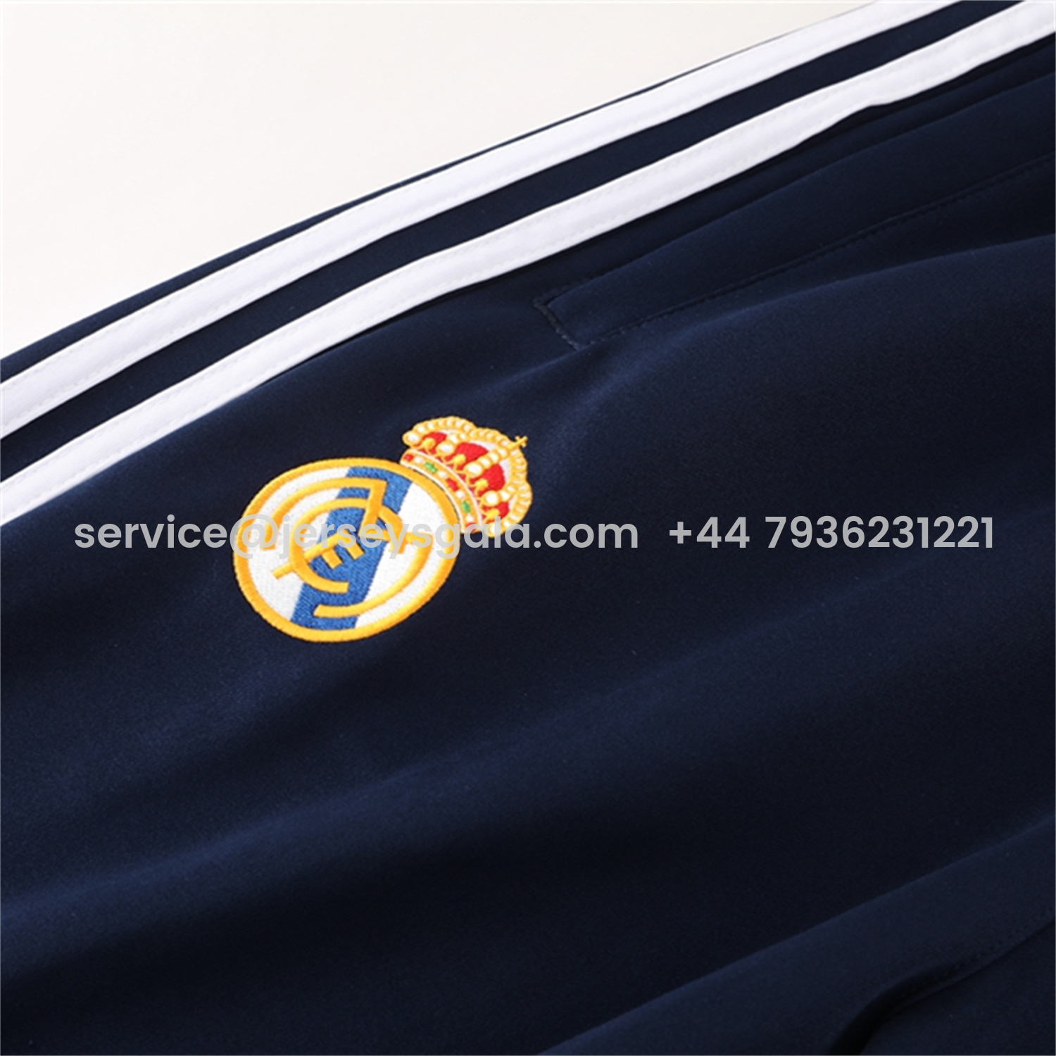 JerseysGala.com | Real Madrid 25-26 Jacket Training Tracksuit - Royal Blue Jackets & Pants with Orange Lines -Customize Name, Number and Patch | Worldwide Shipping