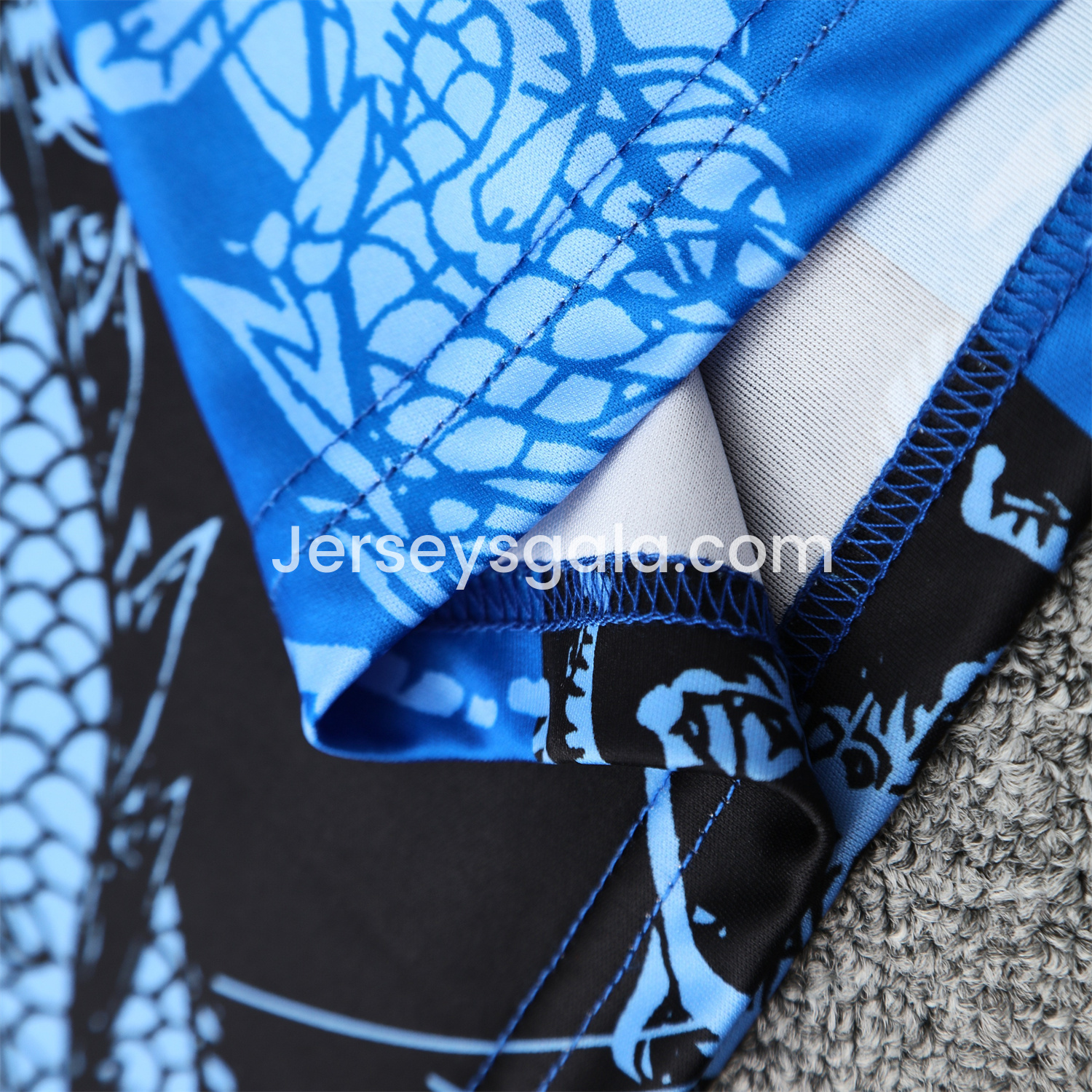 JerseysGala.com | Real Madrid 25-26 Short-Sleeve Training Set - Blue Black Dragon Top & Black-White Shorts -Customize Name, Number and Patch | Worldwide Shipping