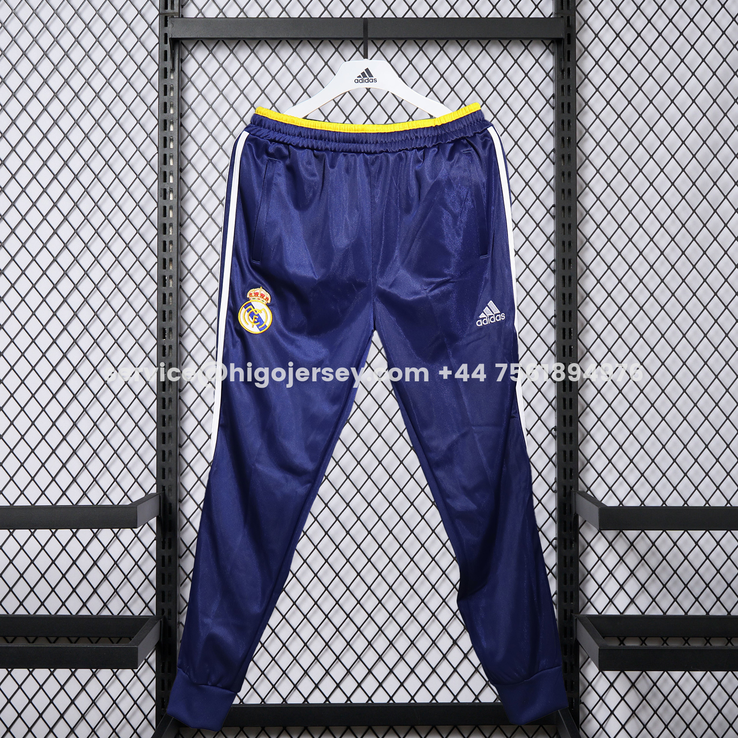 Higojerseys-Real Madrid 25-26 Pure Color Yellow Lines Training Set - Dark Blue Top and Dark Blue Pants
