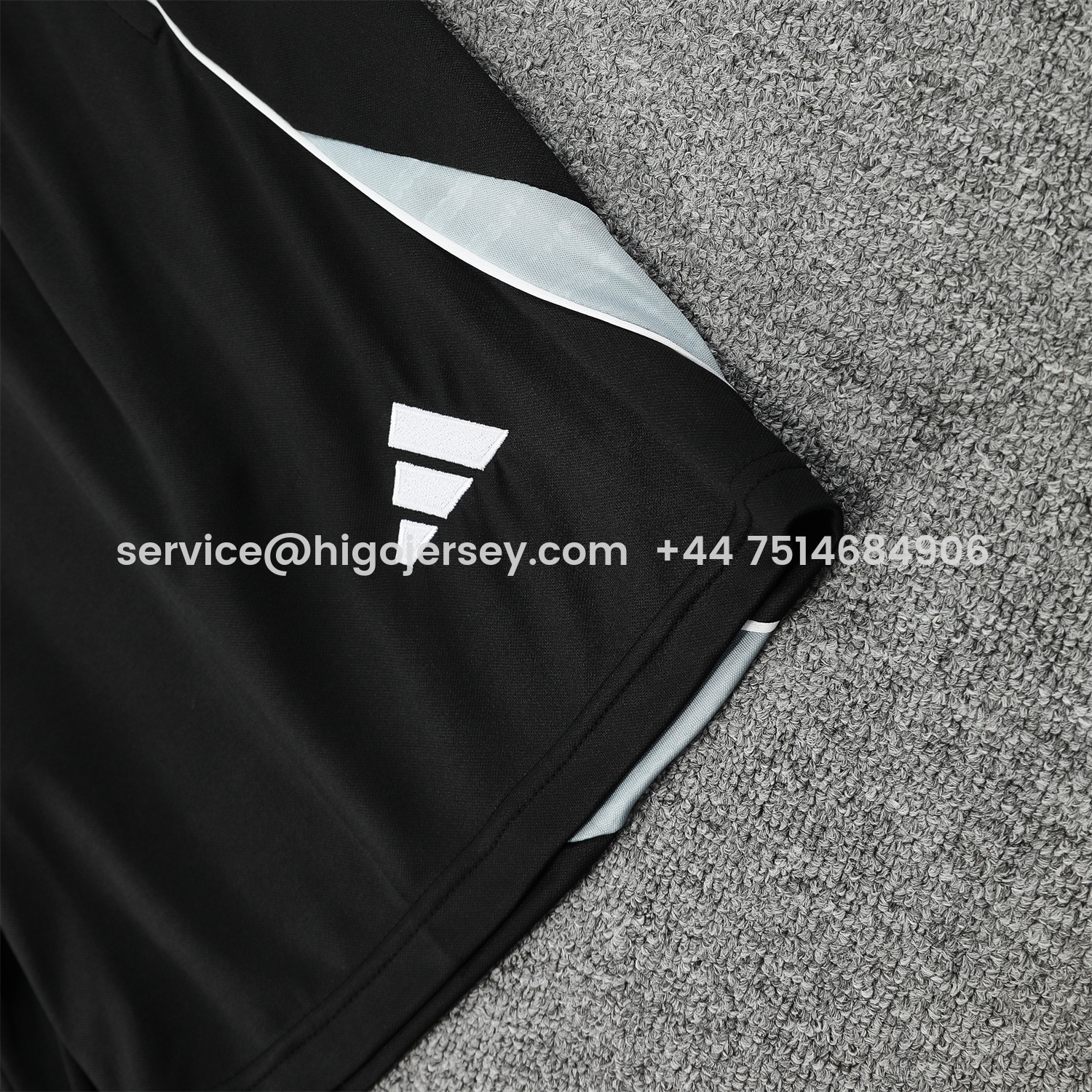 Higojerseys-Real Madrid 25-26 Short-Sleeve Training Set - Pink Arrow Pattern Top & Black Shorts