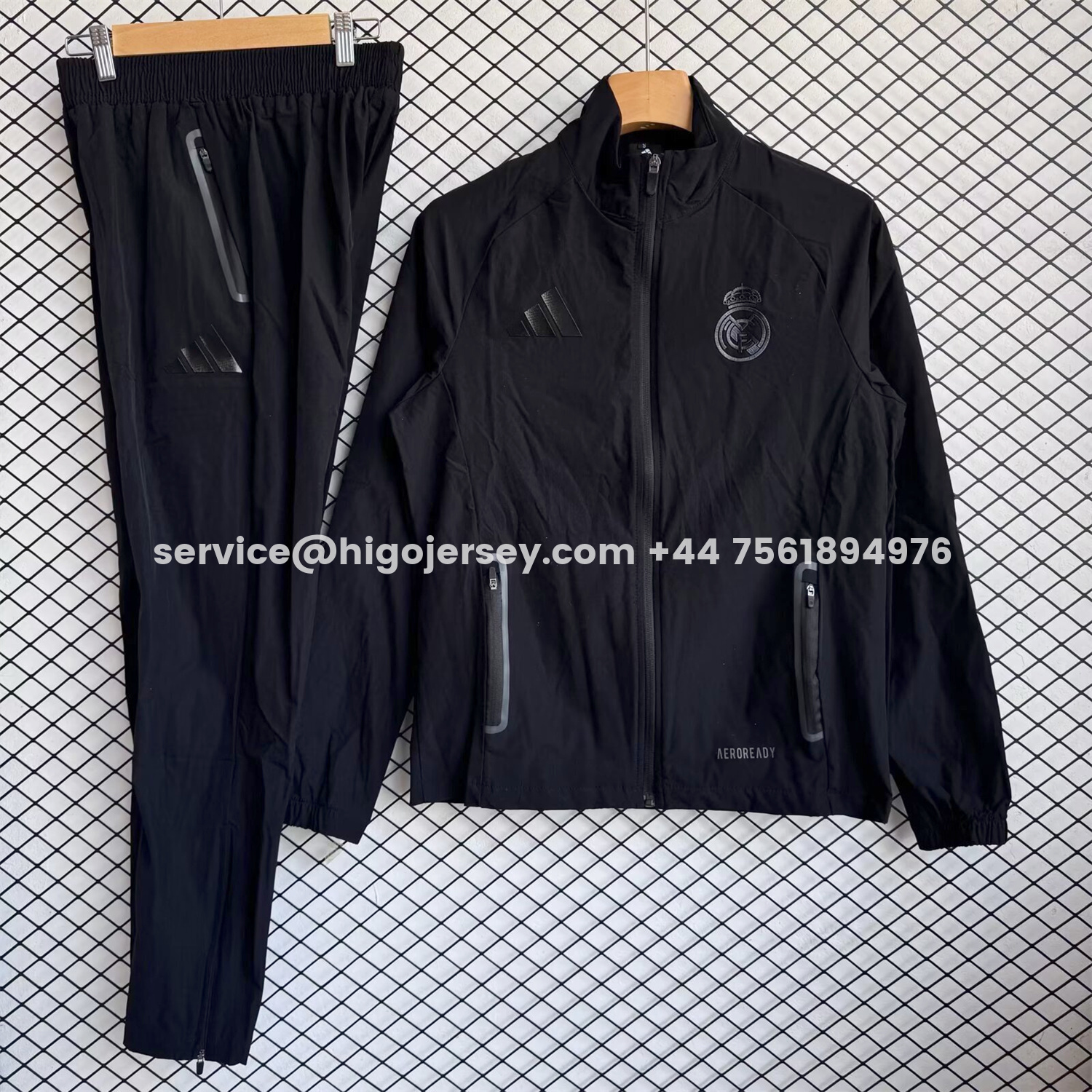 Higojerseys-Real Madrid 25-26 Black Logo Windbreaker Training Set - Black Top and Pants