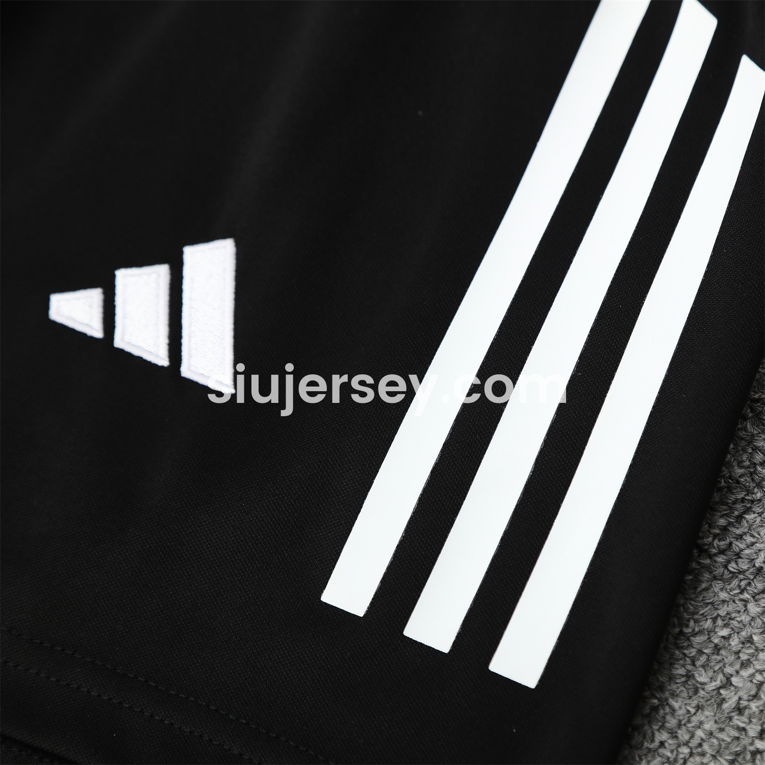 SIUjerseys-Real Madrid 25-26 Short-Sleeve Training Set - Blue Black Dragon Top & Black-White Shorts