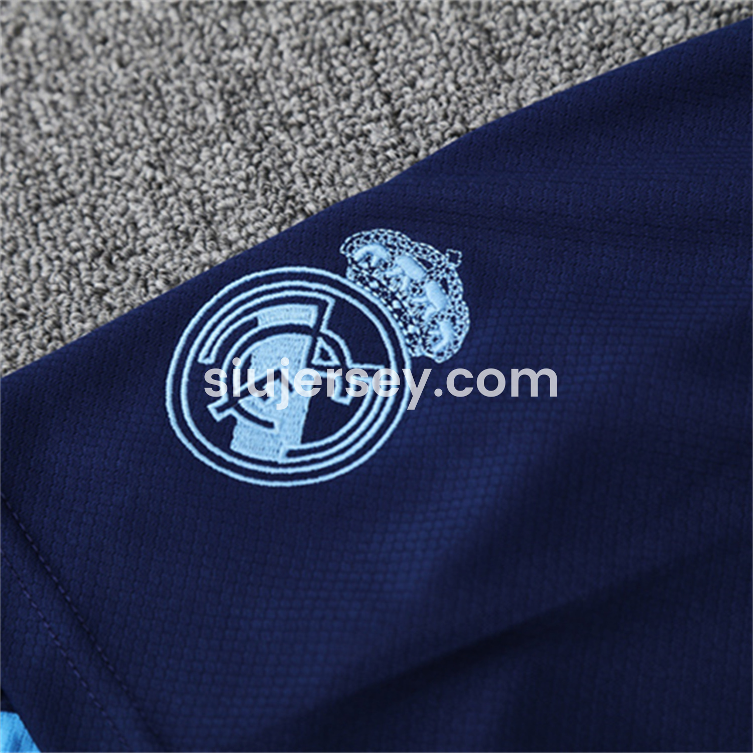 SIUjerseys-Real Madrid 25-26 Pre-Match Kids Short-Sleeve Training Set - Blue-Gray Camouflage Top and Blue Shorts