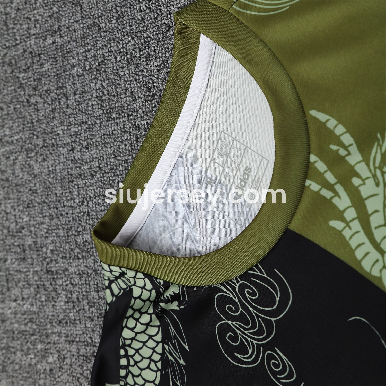 SIUjerseys-Real Madrid 25-26 Short-Sleeve Training Set - Green-Black Dragon Top & Black-White Shorts