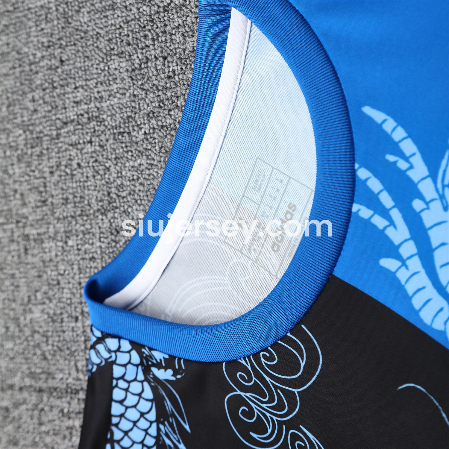 SIUjerseys-Real Madrid 25-26 Short-Sleeve Training Set - Blue Black Dragon Top & Black-White Shorts
