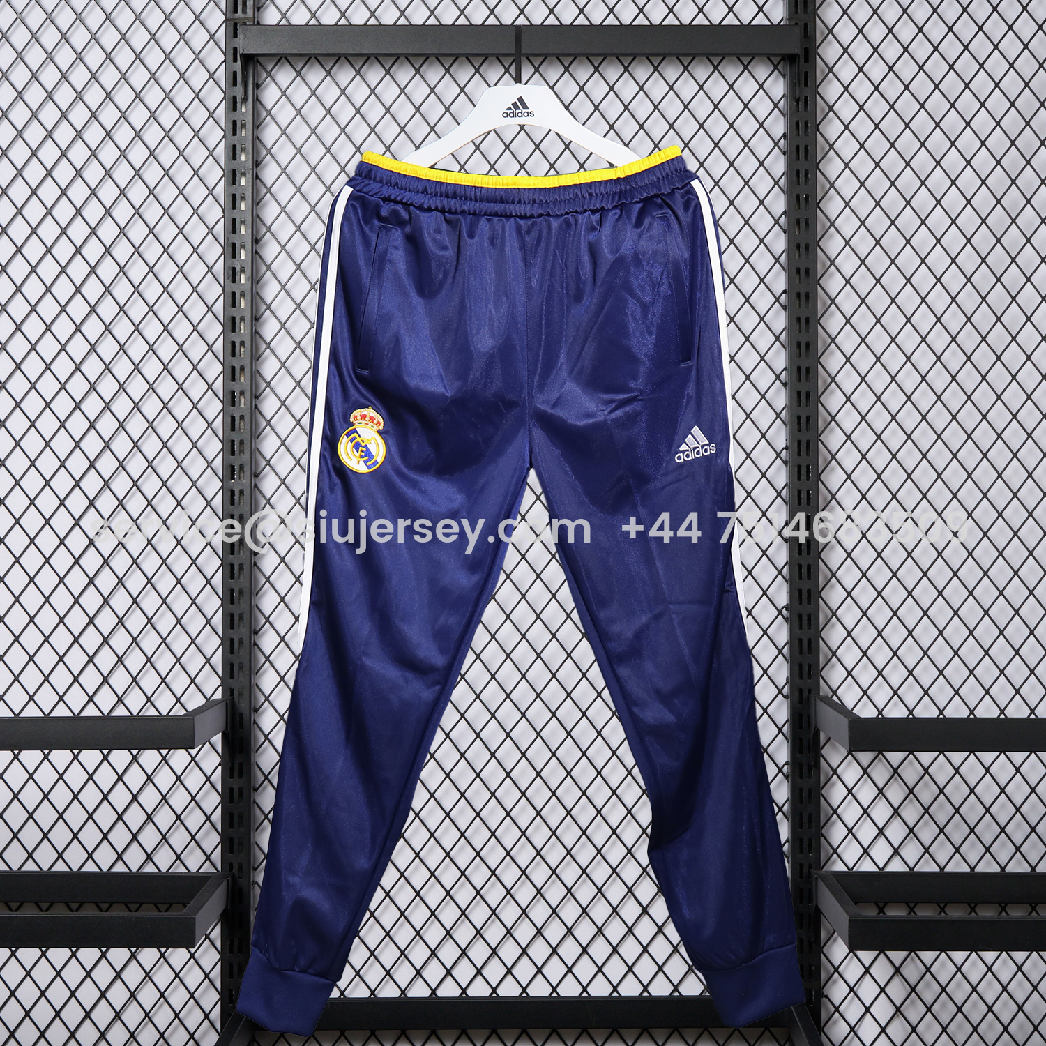 SIUjerseys-Real Madrid 25-26 Pure Color Yellow Lines Training Set - Dark Blue Top and Dark Blue Pants