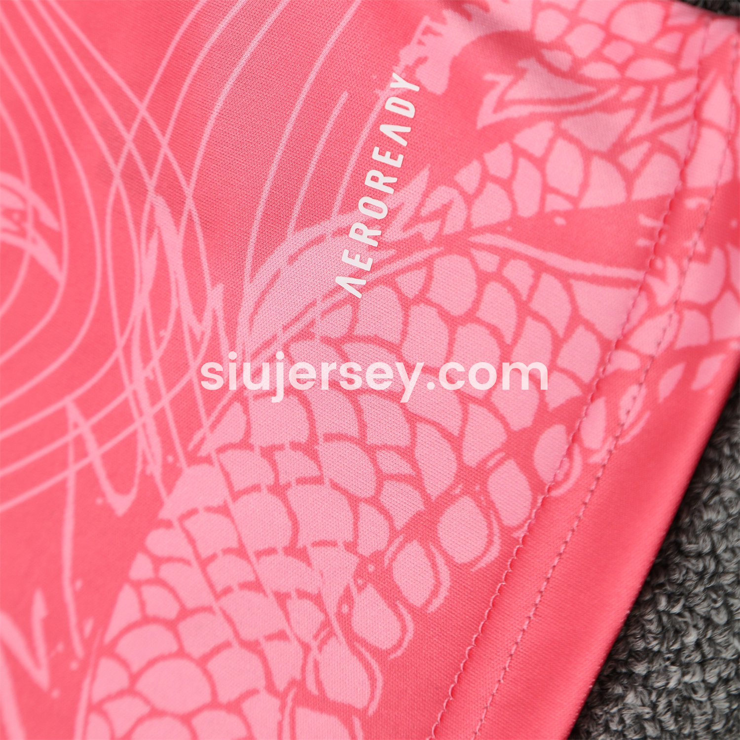 SIUjerseys-Real Madrid 25-26 Short-Sleeve Training Set - Pink-Black Dragon Top & Black-White Shorts