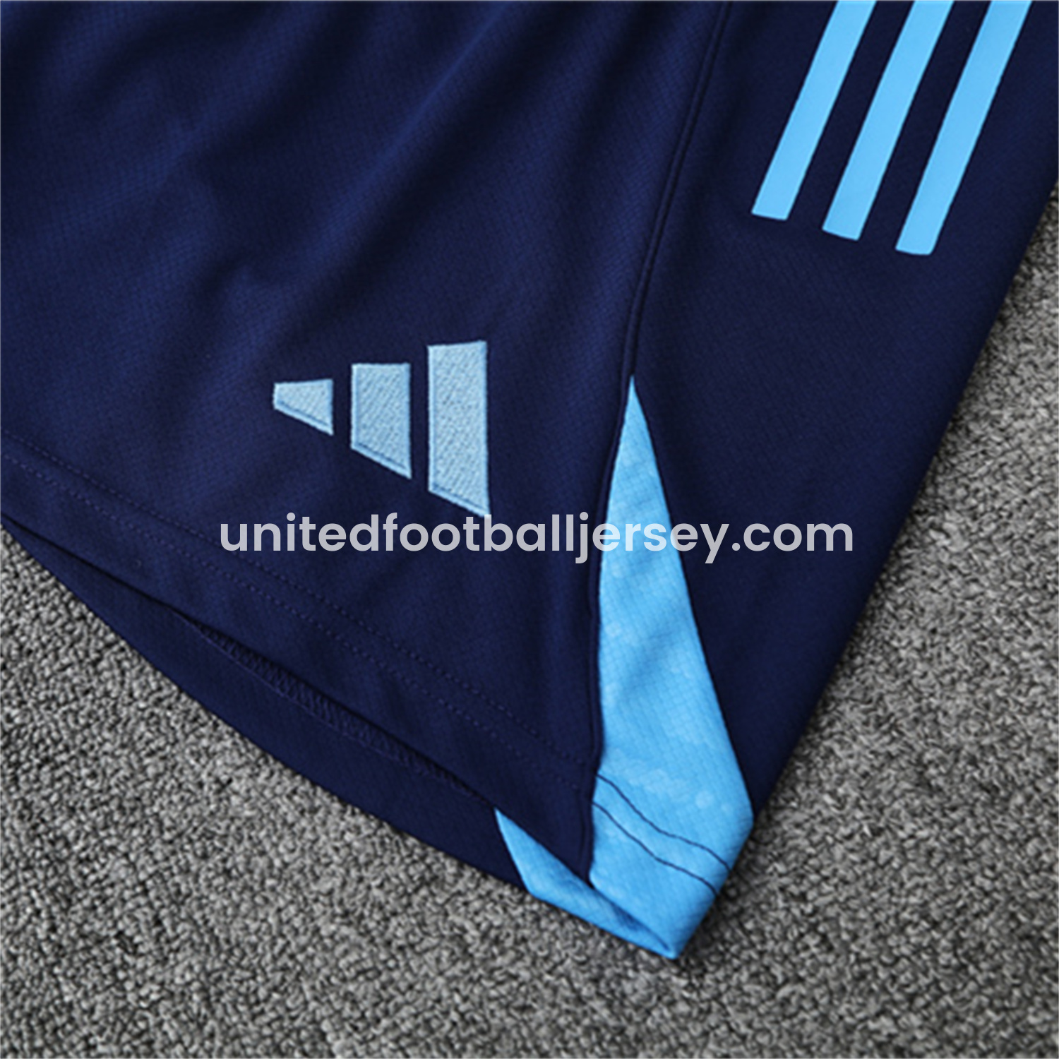 unitedfutballjersey-Real Madrid 25-26 Pre-Match Kids Short-Sleeve Training Set - Blue-Gray Camouflage Top and Blue Shorts