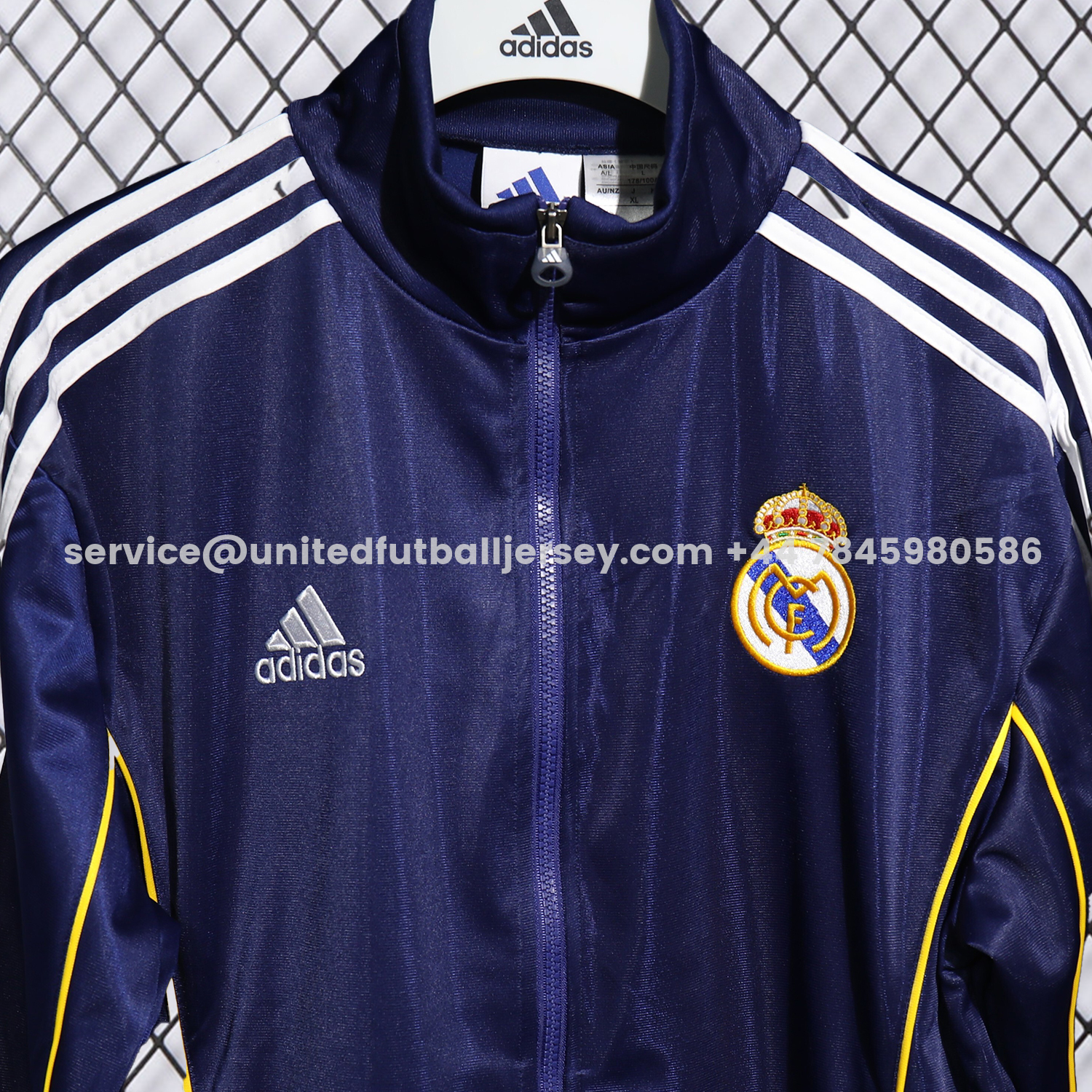 unitedfutballjersey-Real Madrid 25-26 Pure Color Yellow Lines Training Set - Dark Blue Top and Dark Blue Pants