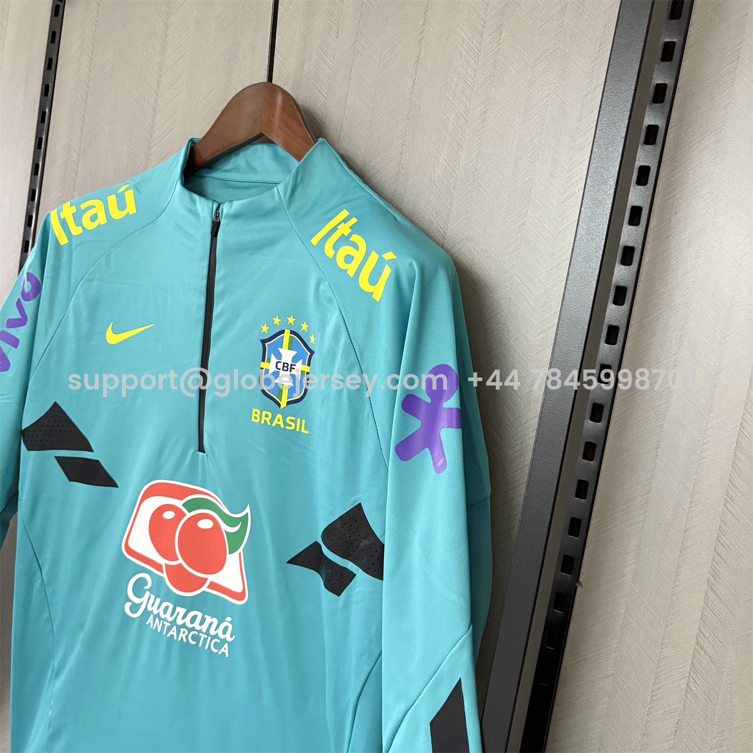 GlobeJersey-Retro Brazil 2022 Pre-Match Cyan Windbreaker