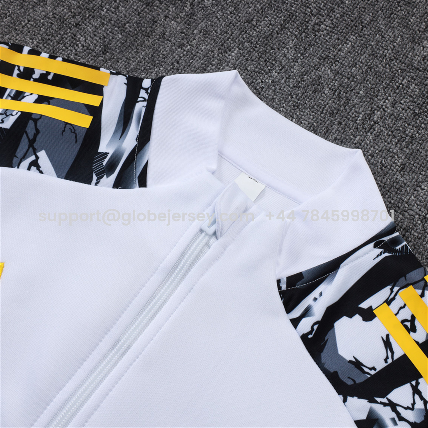 GlobeJersey-Real Madrid 25-26 Unsponsored Long Sleeve Training Set - White Top & Black Pants