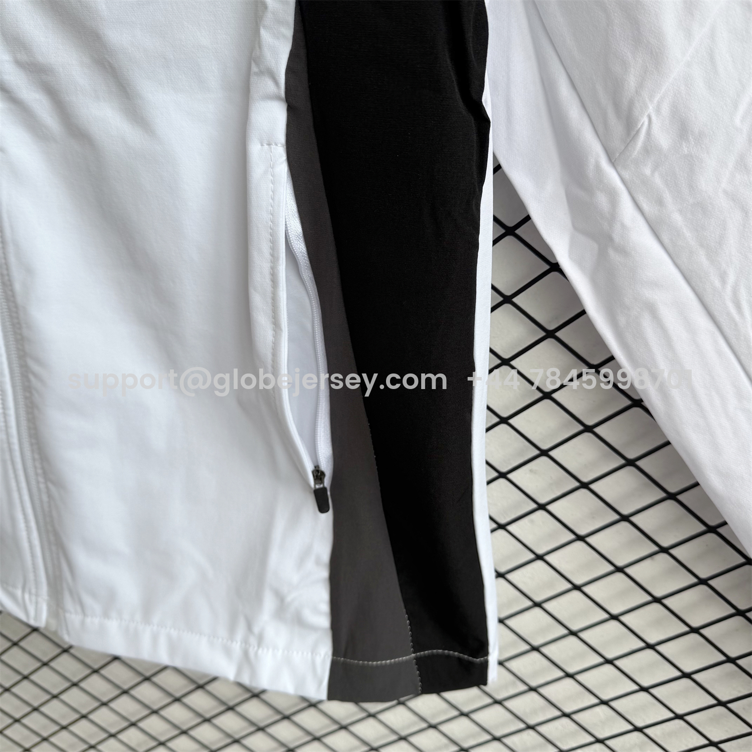 GlobeJersey-Real Madrid 25-26 Windbreaker Training Set - White With Black Top and Black Pants