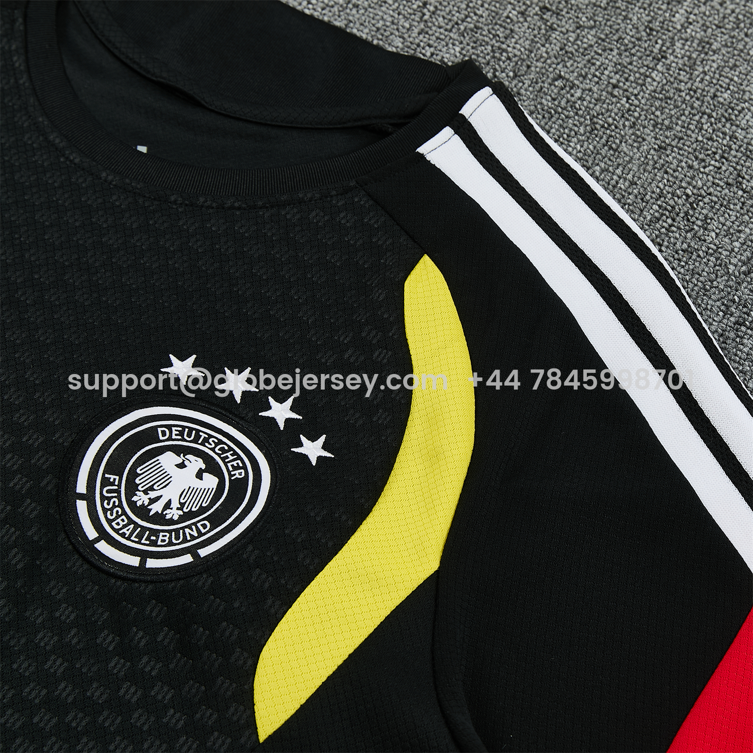 GlobeJersey-Germany 2026 Short-Sleeve Training Set - Black With Red Top & Black With Red PantsGermany 2026 Short-Sleeve Training Set - Black With Red Top & Black With Red Pants