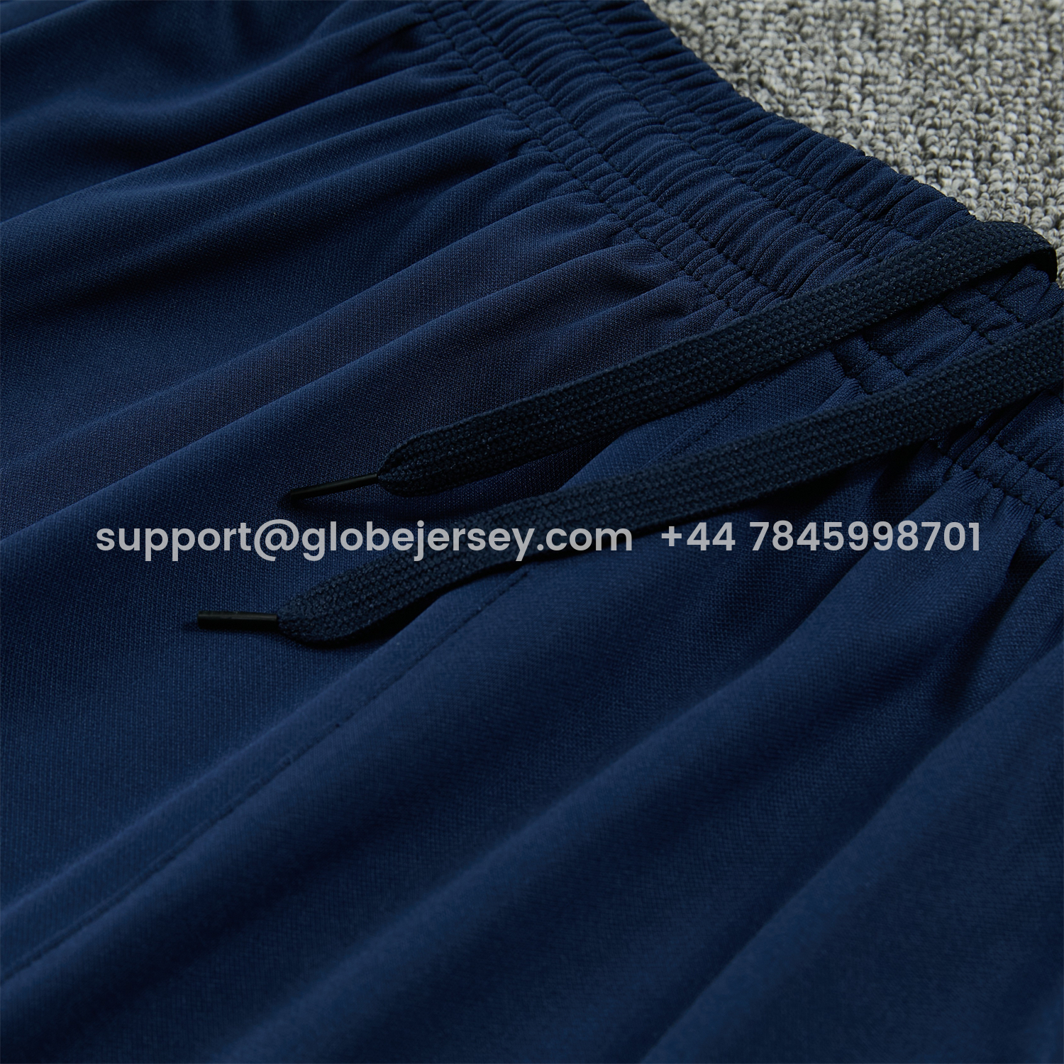 GlobeJersey-Barcelona 25-26 Short-Sleeve Training Set - Colors Top & Dark Blue With A Small Pink Detail Pants