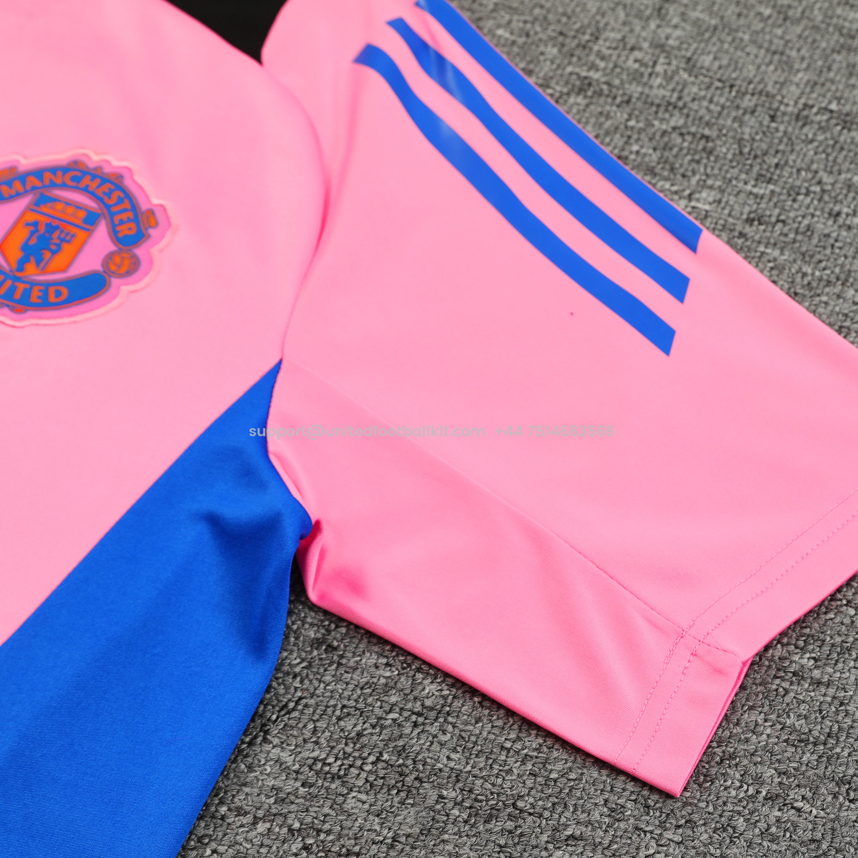 Unitedfootballkit.com | Manchester United 24-25 Short-Sleeve Training Set - Pink Top and Black Shorts -Customize Name, Number and Patch | Worldwide Shipping