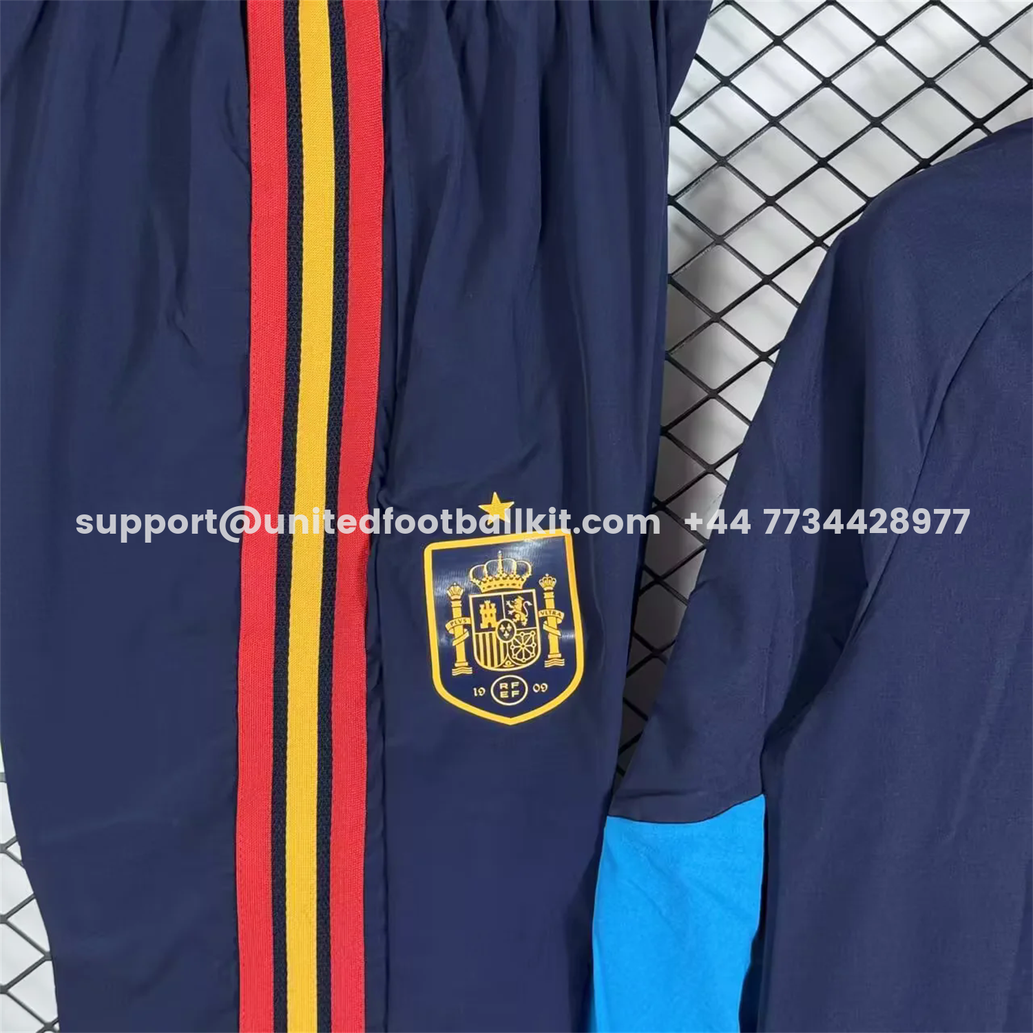 Unitedfootballkit.com | Spain 2026 Windbreaker Training Set - Blue Top and Pants -Customize Name, Number and Patch | Worldwide Shipping