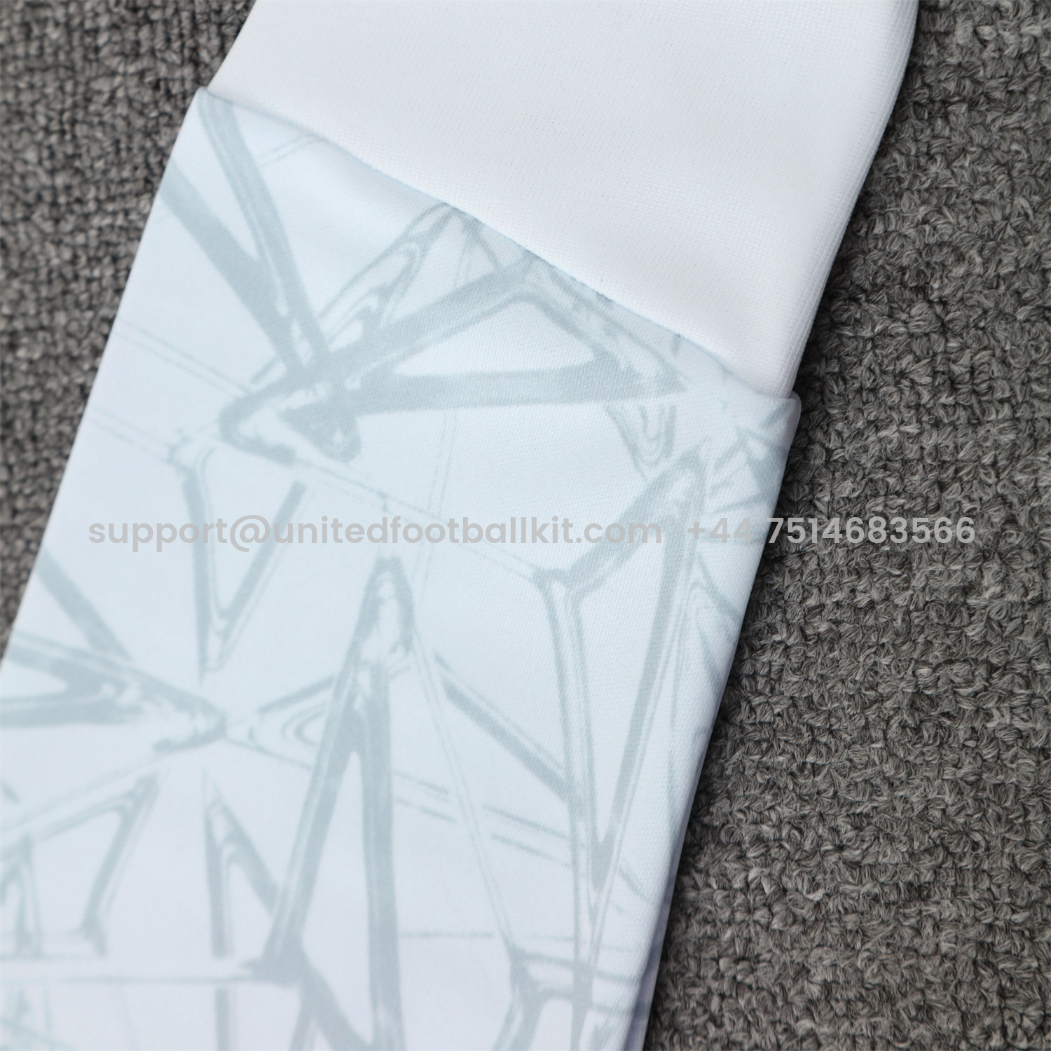 Unitedfootballkit.com | Real Madrid 25-26 Traning Hoodie Set - Triangular Spots White Hoodie With Black Pants -Customize Name, Number and Patch | Worldwide Shipping