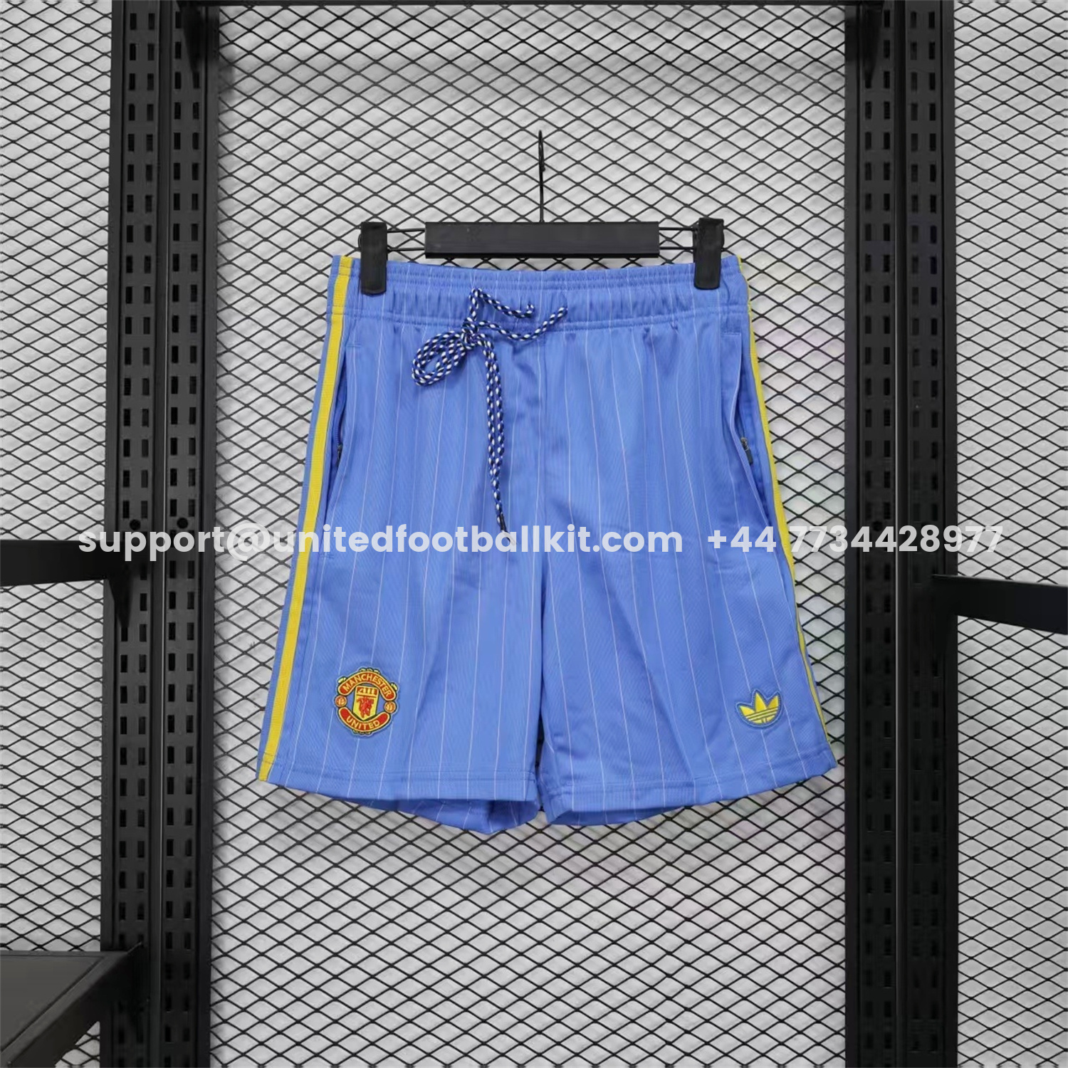 Unitedfootballkit.com | Manchester United 25-26 Trefoil Blue Travel Shorts - Player Version -Customize Name, Number and Patch | Worldwide Shipping