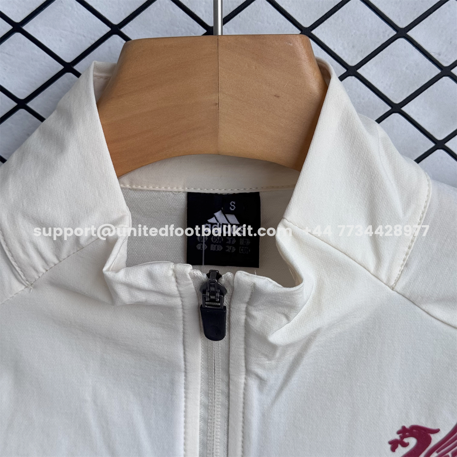 Unitedfootballkit.com | Liver.pool 25-26 Hooded Windbreaker Training Set - Cream Top & Black Pants -Customize Name, Number and Patch | Worldwide Shipping