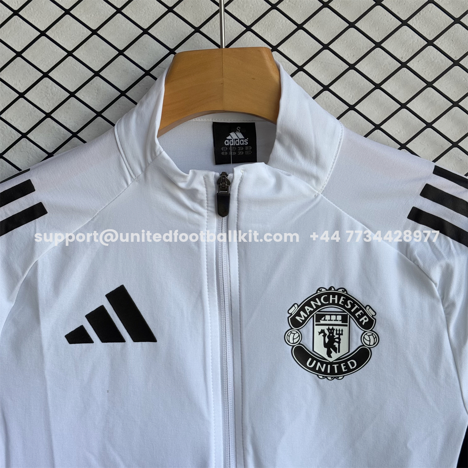 Unitedfootballkit.com | Manchester United 25-26 Windbreaker Training Set - White Top and Black Pants -Customize Name, Number and Patch | Worldwide Shipping