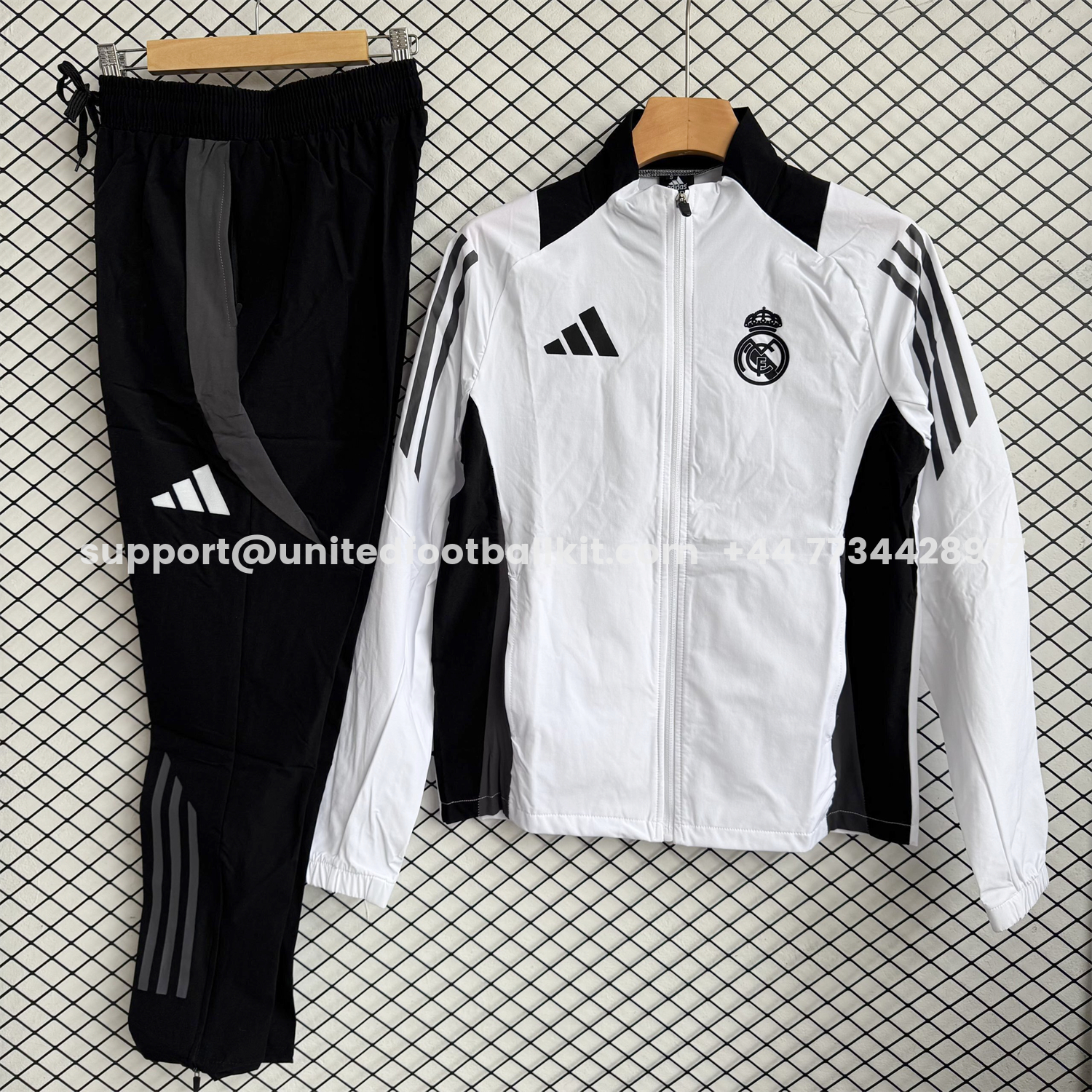 Unitedfootballkit.com | Real Madrid 25-26 Windbreaker Training Set - White With Black Top and Black Pants -Customize Name, Number and Patch | Worldwide Shipping