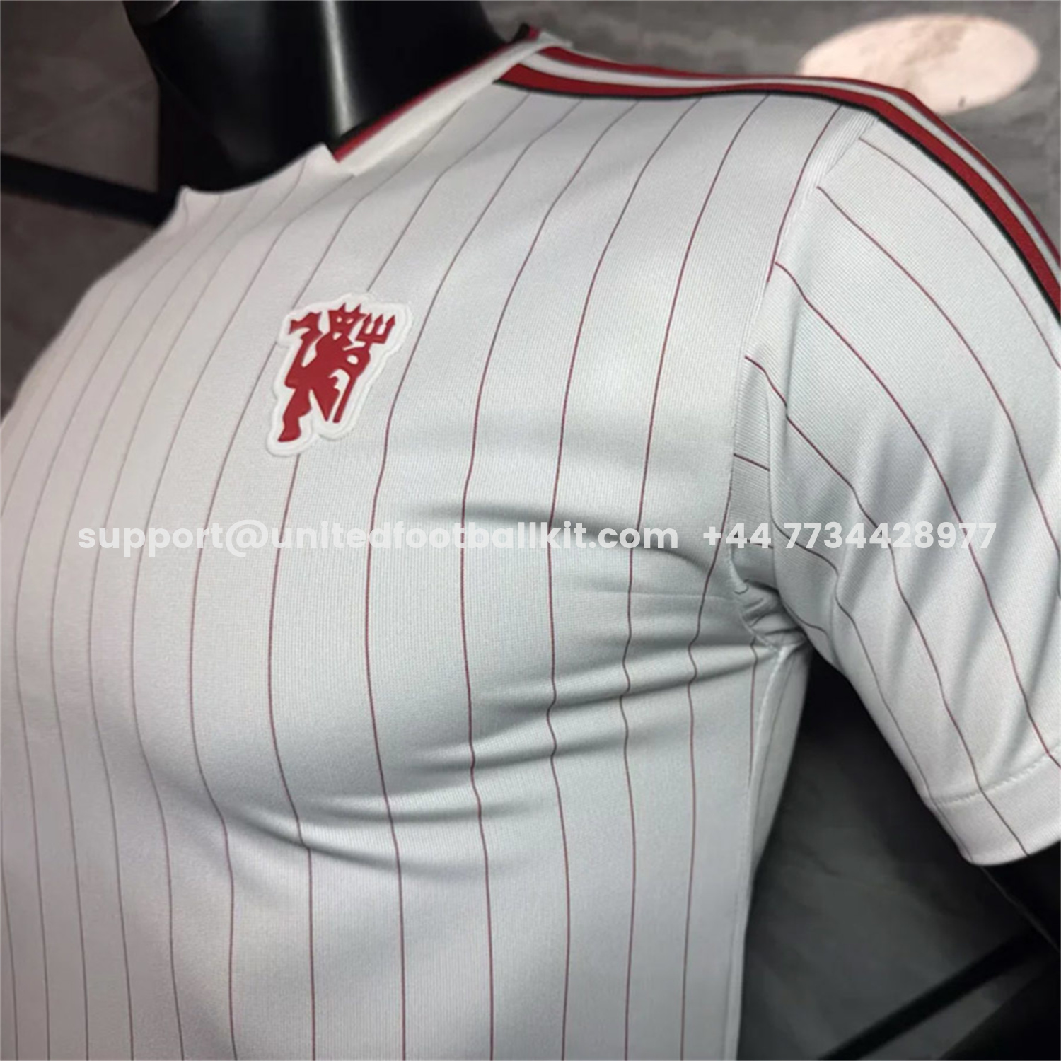 Unitedfootballkit.com | Manchester United 25-26 Trefoil Red Lines White Travel Jersey - Player Version -Customize Name, Number and Patch | Worldwide Shipping