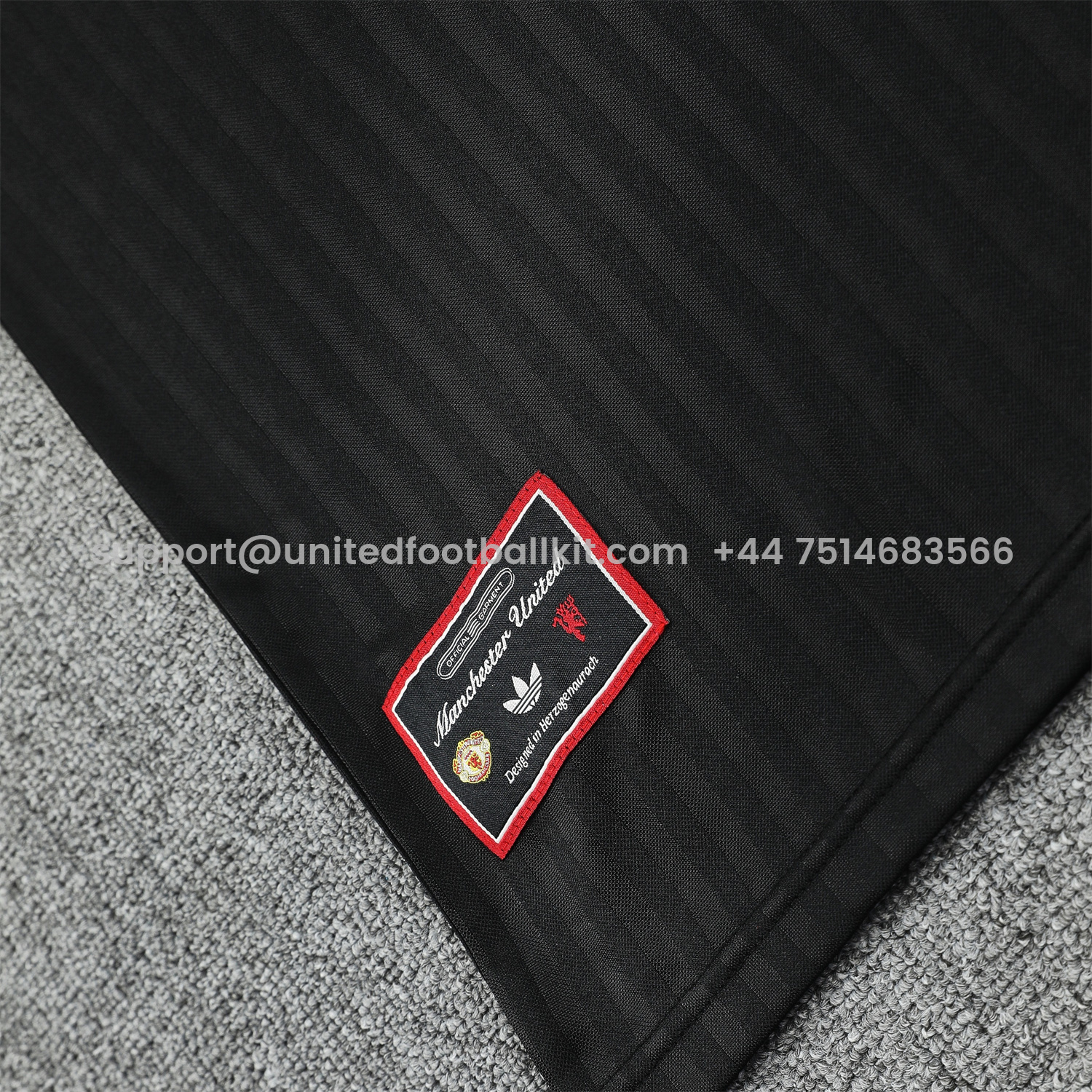 Unitedfootballkit.com | Manchester United 25-26 Short-Sleeve Training Set - Red Lines Black Top & Black Shorts -Customize Name, Number and Patch | Worldwide Shipping