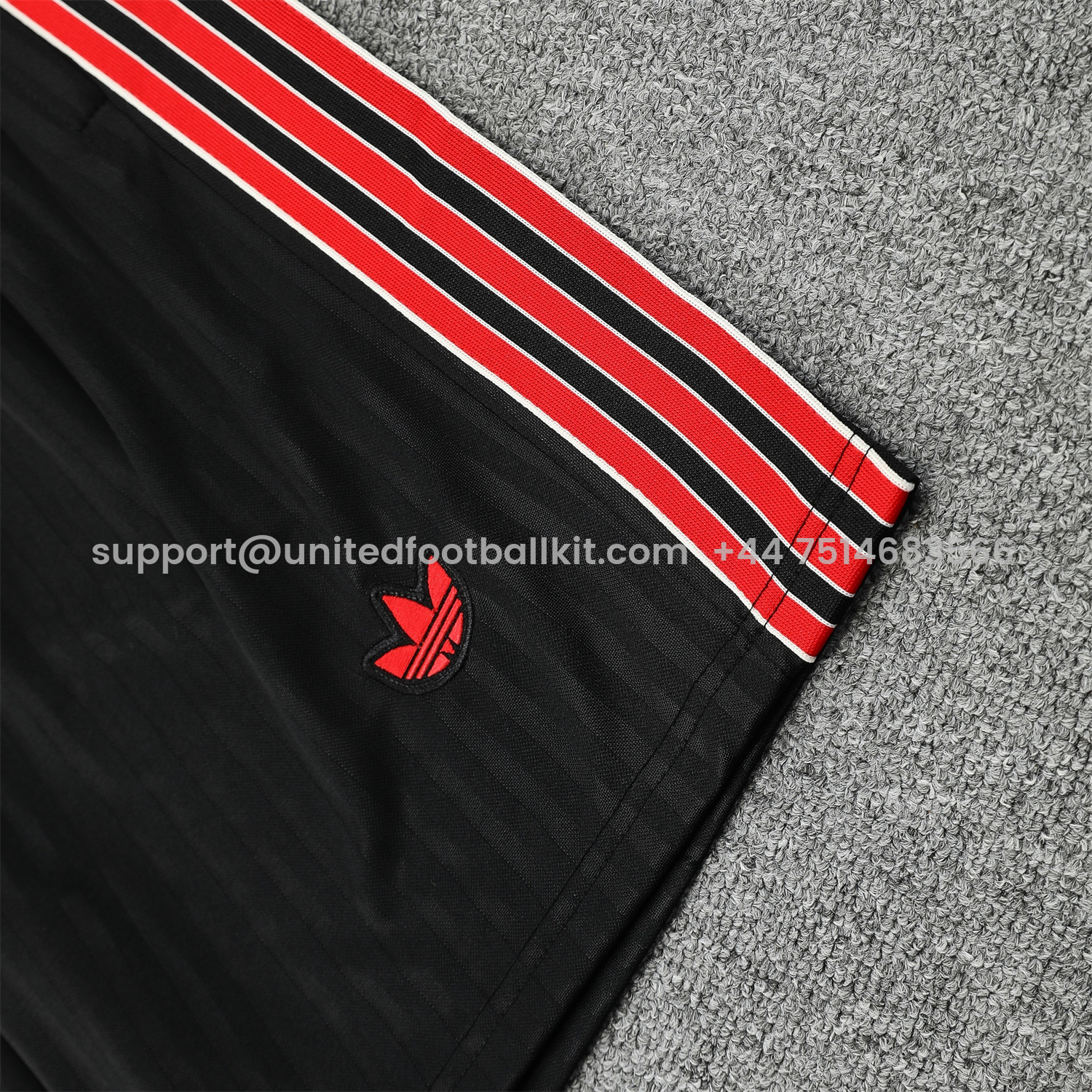 Unitedfootballkit.com | Manchester United 25-26 Short-Sleeve Training Set - Red Lines Black Top & Black Shorts -Customize Name, Number and Patch | Worldwide Shipping