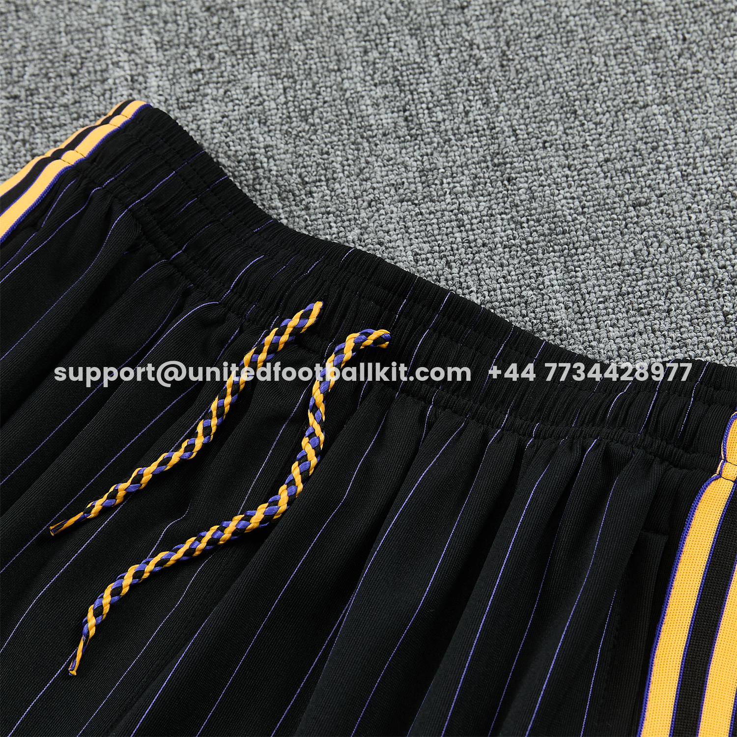 Unitedfootballkit.com | Manchester United 25-26 Retro Style Short-Sleeve Training Set - Black With Yellow Accents Top & Pants -Customize Name, Number and Patch | Worldwide Shipping