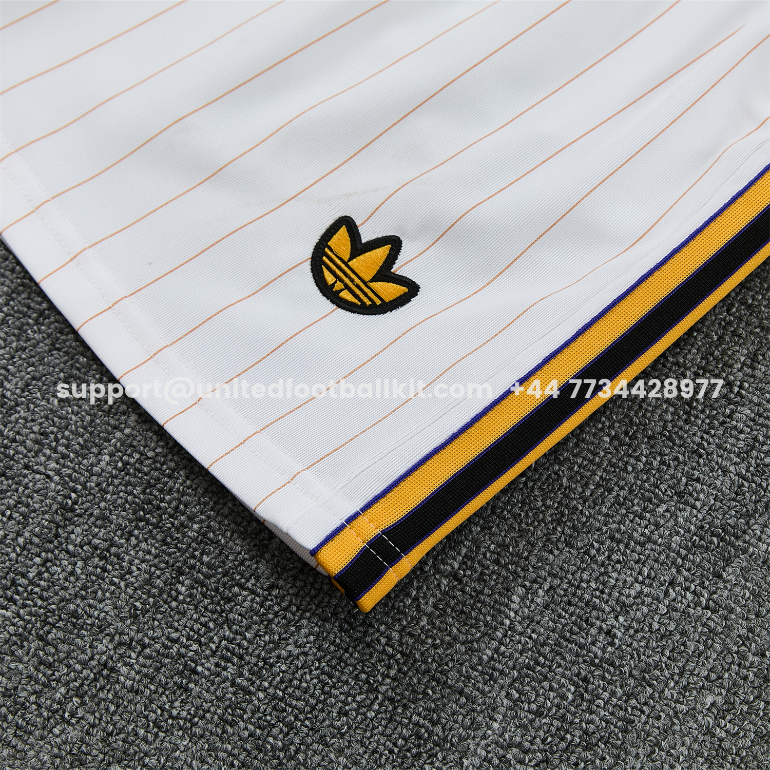 Unitedfootballkit.com | Manchester United 25-26 Retro Style Short-Sleeve Training Set - White With Thin Black Stripes Top & Pants -Customize Name, Number and Patch | Worldwide Shipping