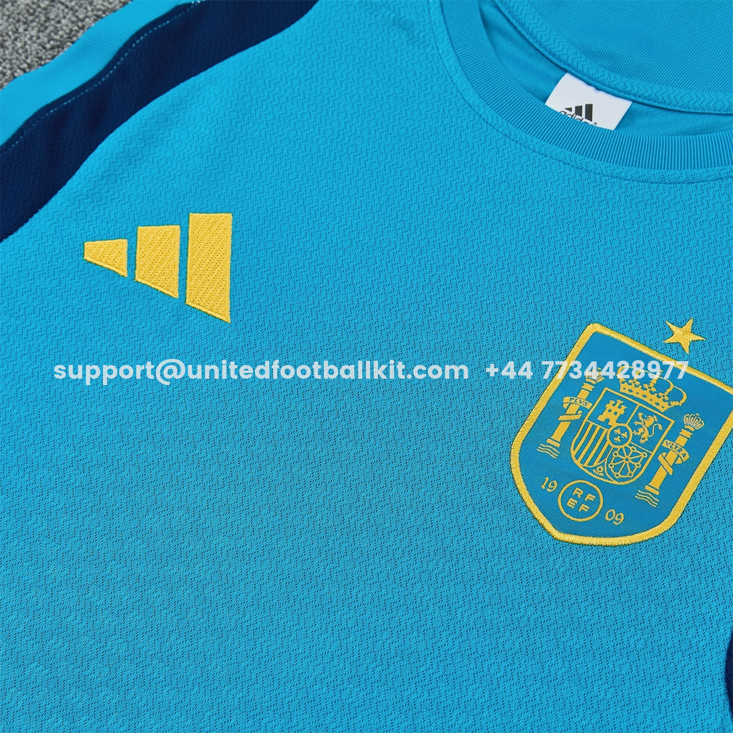 Unitedfootballkit.com | Spain 2026 Vest Training Set - Lake Blue Vest and Dark Blue Shorts -Customize Name, Number and Patch | Worldwide Shipping