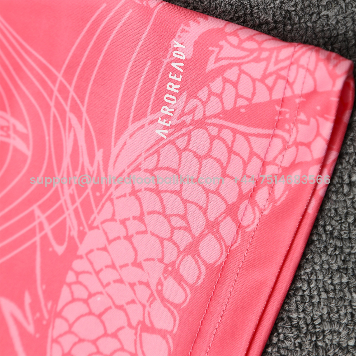 Unitedfootballkit.com | Real Madrid 25-26 Vest Training Set - Pink-Black Dragon Vest & Black-White Shorts -Customize Name, Number and Patch | Worldwide Shipping