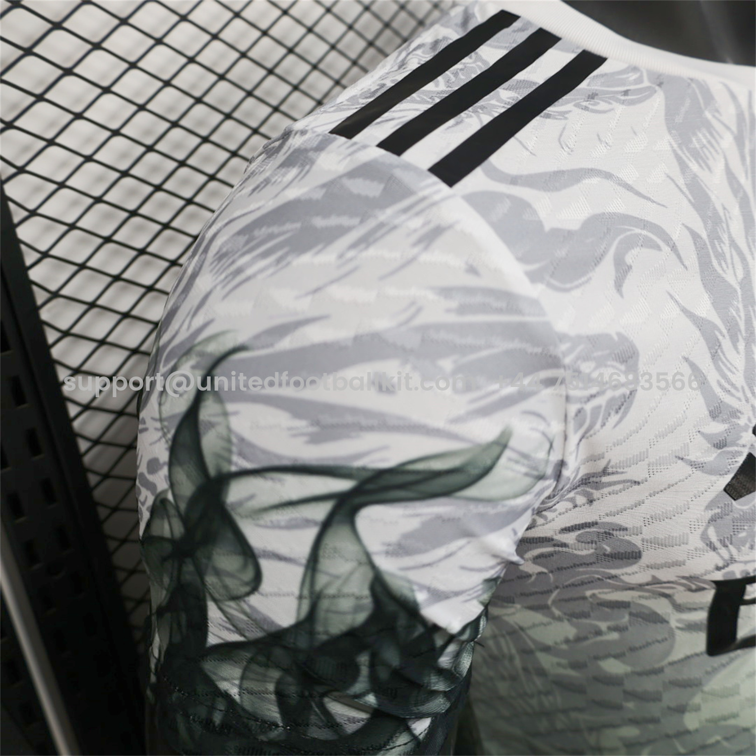 Unitedfootballkit.com | Real Madrid 25-26 Black Green Dragon Soars White Jersey - Player Version -Customize Name, Number and Patch | Worldwide Shipping