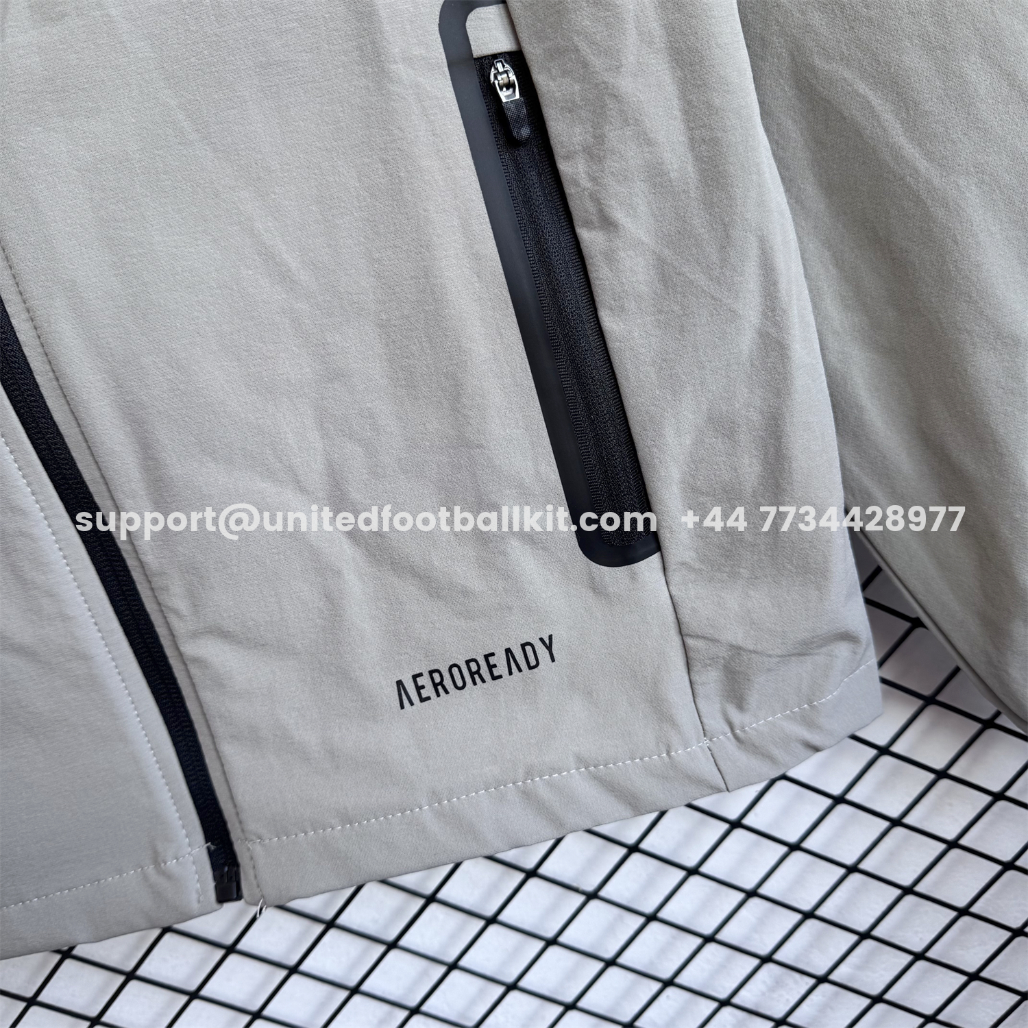 Unitedfootballkit.com | Real Madrid 25-26 Windbreaker Training Set - Pure Grey Top and Pants -Customize Name, Number and Patch | Worldwide Shipping