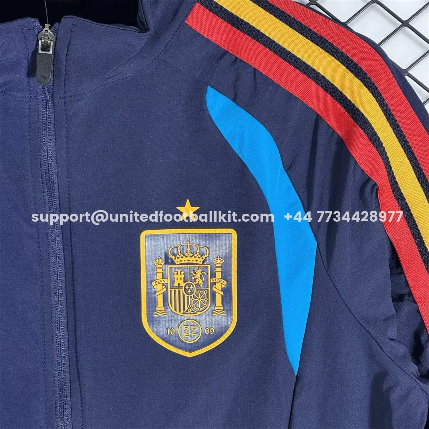 Unitedfootballkit.com | Spain 2026 Windbreaker Training Set - Blue Top and Pants -Customize Name, Number and Patch | Worldwide Shipping