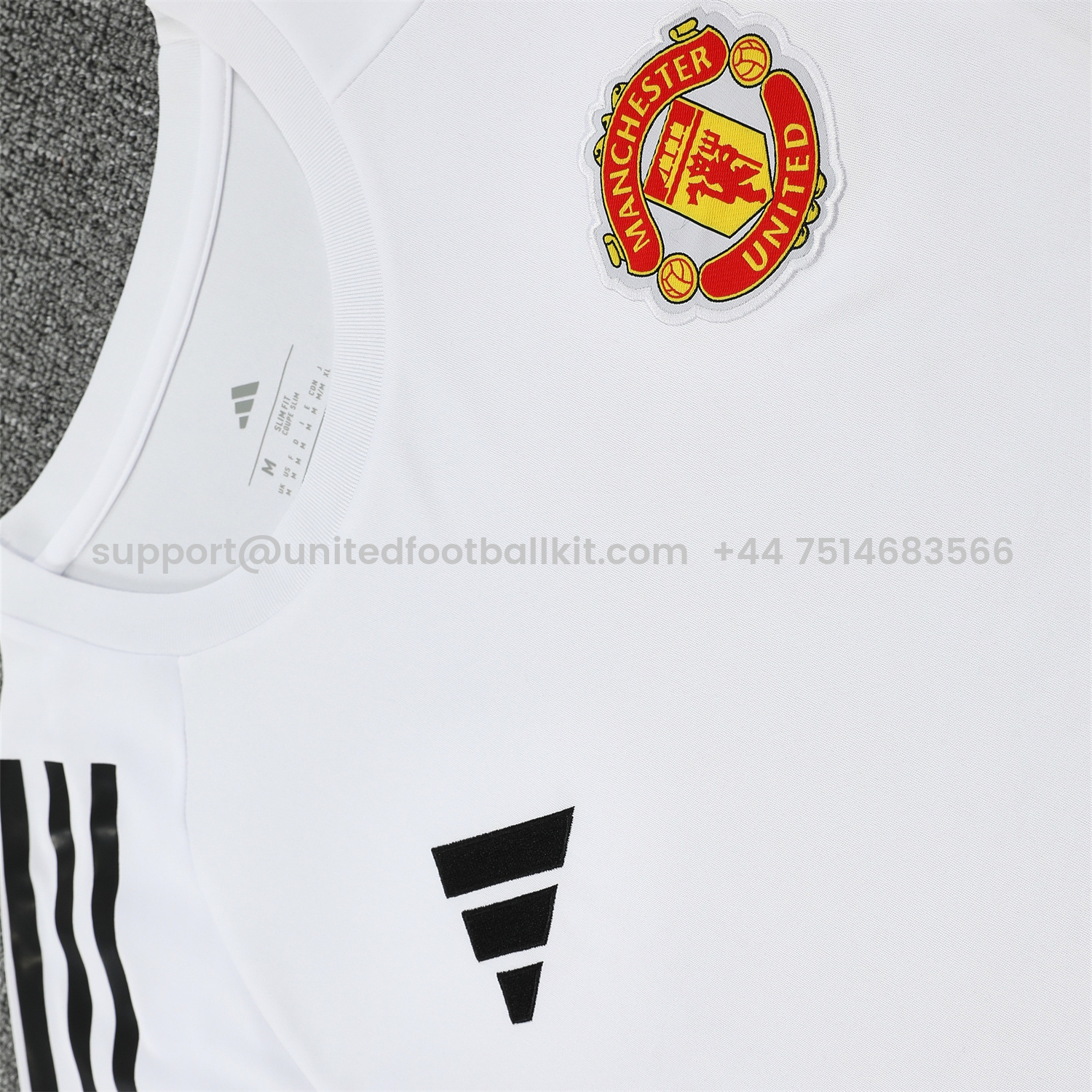 Unitedfootballkit.com | Manchester United 25-26 Short-Sleeve Training Set - Red Black Blocks White Top & Black Shorts -Customize Name, Number and Patch | Worldwide Shipping