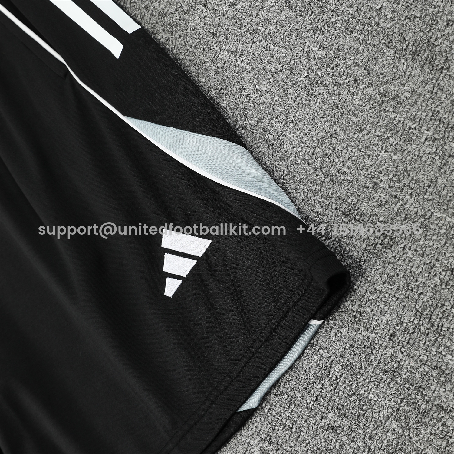 Unitedfootballkit.com | Real Madrid 25-26 Short-Sleeve Training Set - Grey Arrow Pattern Top & Black Shorts -Customize Name, Number and Patch | Worldwide Shipping