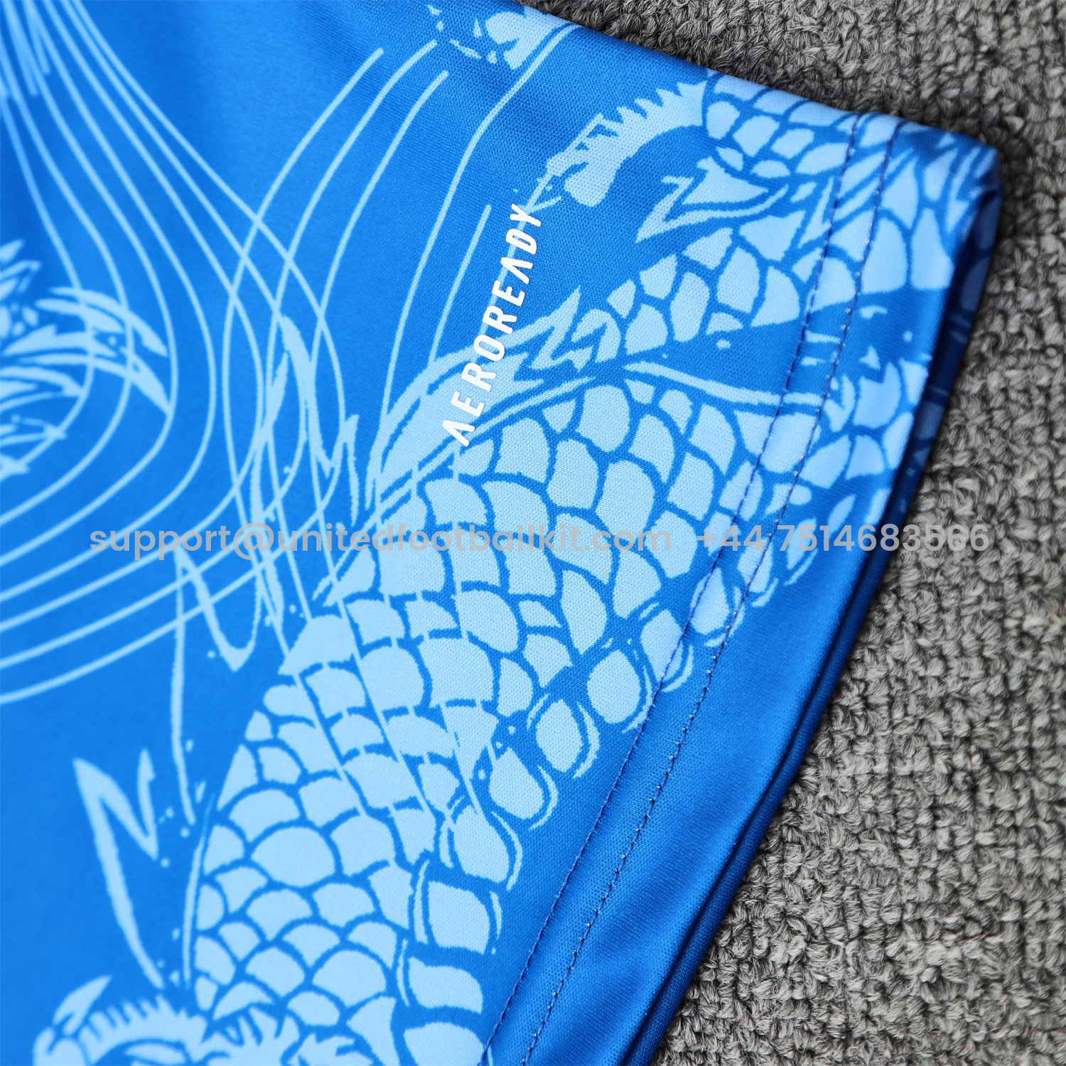 Unitedfootballkit.com | Real Madrid 25-26 Short-Sleeve Training Set - Blue Black Dragon Top & Black-White Shorts -Customize Name, Number and Patch | Worldwide Shipping