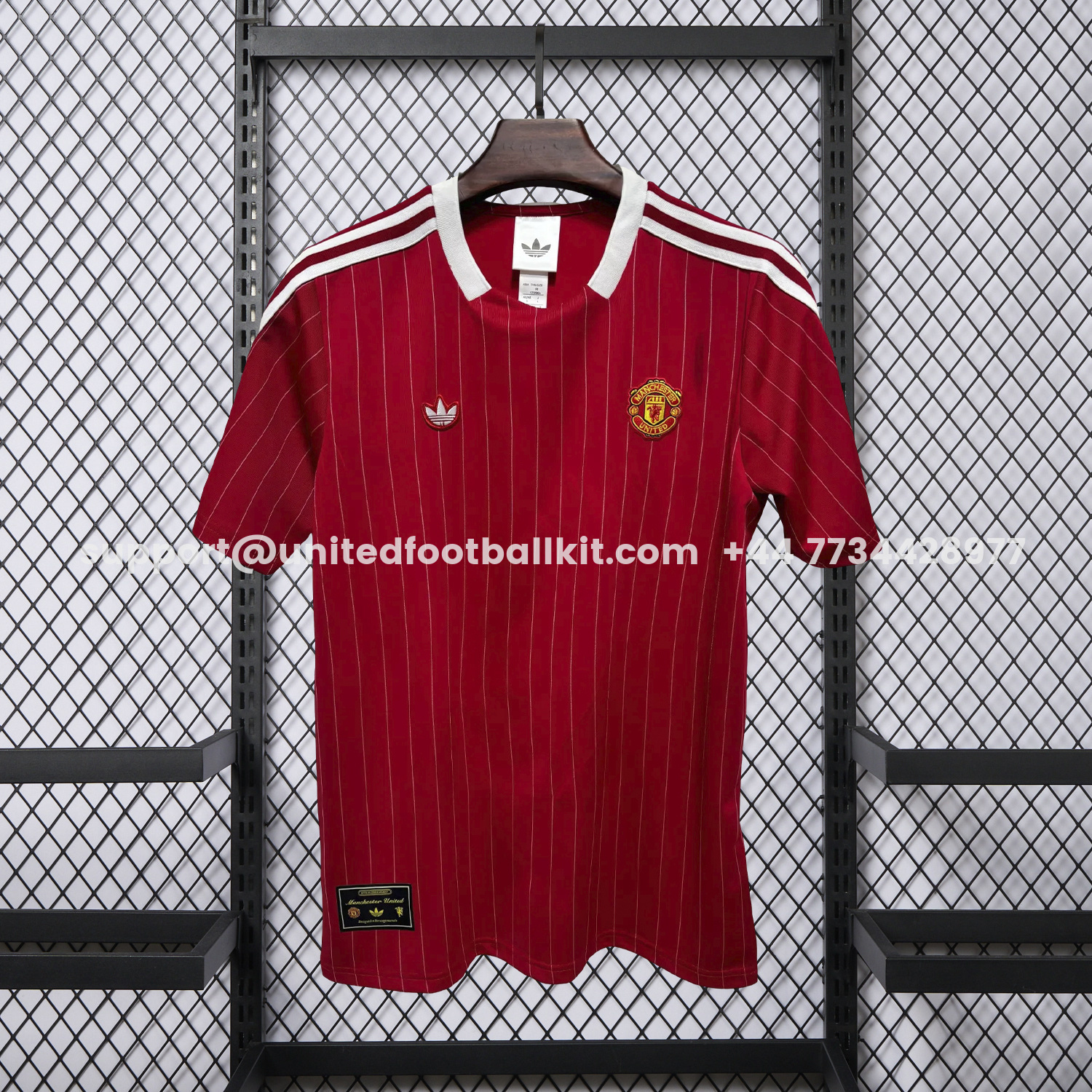 Unitedfootballkit.com | Manchester United 25-26 Trefoil Red Travel Jersey - Fans Version -Customize Name, Number and Patch | Worldwide Shipping