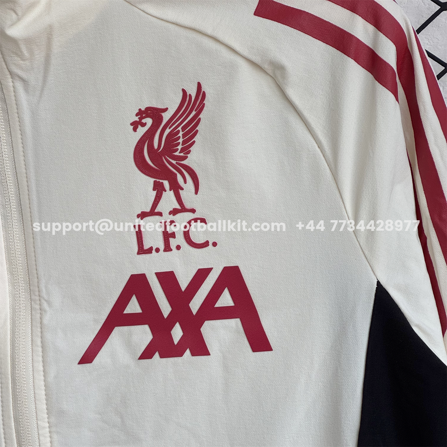 Unitedfootballkit.com | Liver.pool 25-26 Hooded Windbreaker Training Set - Cream Top & Black Pants -Customize Name, Number and Patch | Worldwide Shipping