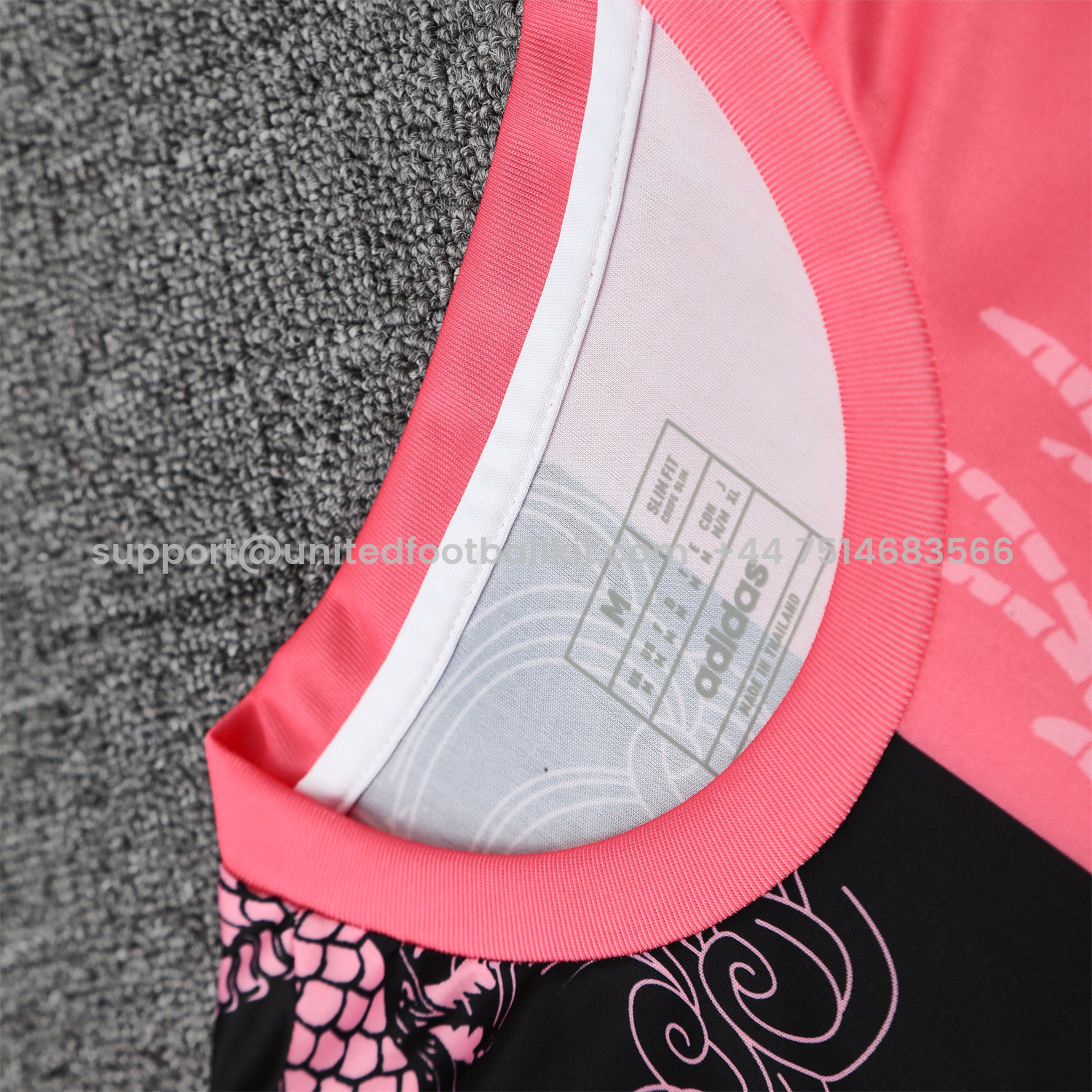Unitedfootballkit.com | Real Madrid 25-26 Vest Training Set - Pink-Black Dragon Vest & Black-White Shorts -Customize Name, Number and Patch | Worldwide Shipping