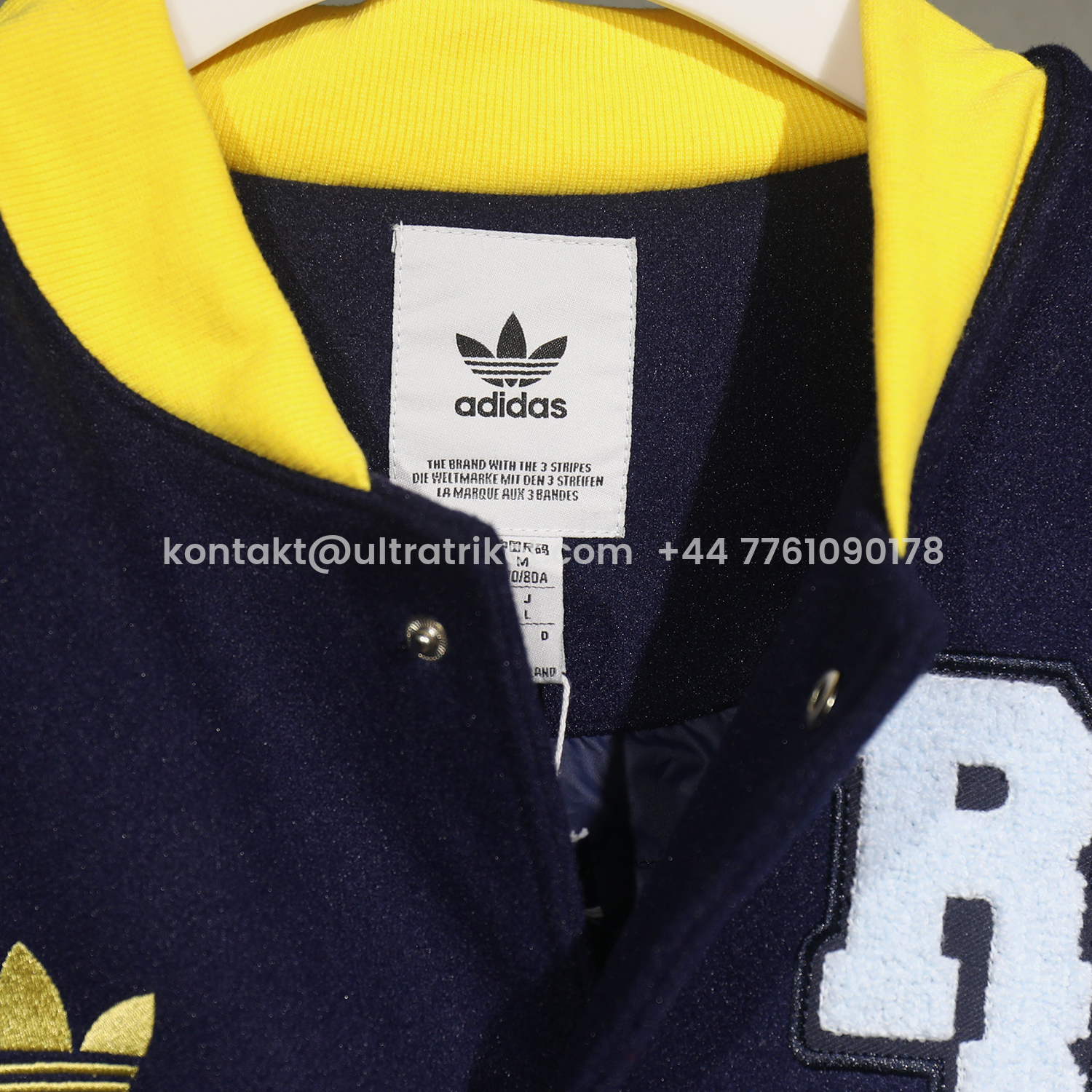 UltraTrikot-Real Madrid 25-26 Warm Windbreaker Jacket - Dark Blue And White